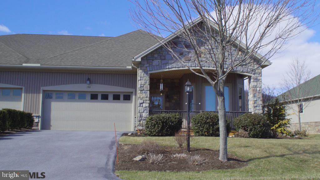 Care free living describes this beautiful 3 bedroom, 2.5 bath condo located at OpeQuon Hills in Bellefonte. Conveniently located within minutes of downtown Victorian Bellefonte as well as within 15 minutes of the university. Walk into the large foyer which opens to the living room, great room, kitchen, and dining area. Hardwood flooring is throughout this ranch home. Master bedroom en suite with walk in closet. Large custom kitchen cabinets with granite counter tops. Admire the stunning view from the back deck in the morning or evening. Large unfinished basement. For more information contact listing agent for details or showings.