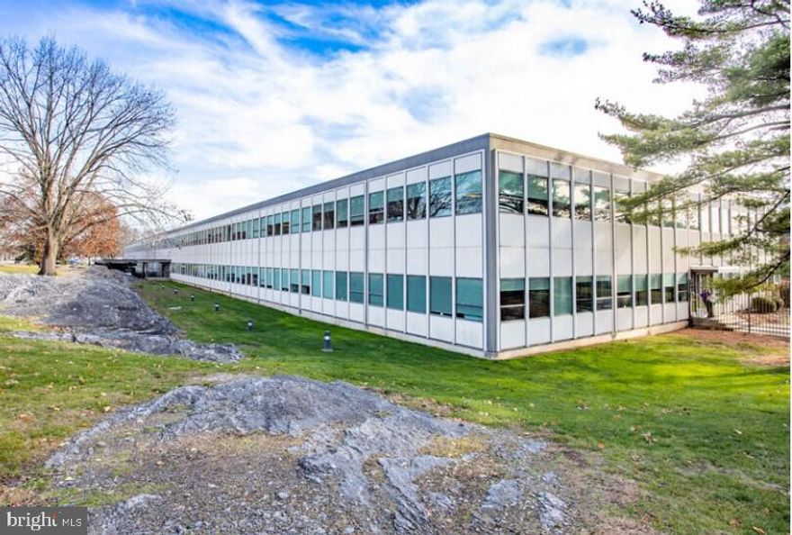 Located on the 2nd floor, this suite offers 21,698 square feet of "To Be Built" office space. It can feature several private offices, large meeting rooms, a bullpen area, and a spacious employee lunchroom. The space is a blank canvas in need of completion and will include modern finishes, great views, elevator service, and a sprinkler system. Delivery will depend on the level of improvement, with an estimated lease rate of $12.95 per square foot NNN.
BURLE Business Park covers 74 acres and boasts over 1.2 million square feet of commercial and industrial space, conveniently located 2 minutes from U.S. Route 30 in Lancaster, Pennsylvania. Originally a U.S. Navy plant in 1942, it was later acquired by RCA for tube manufacturing. In 1986, after being refitted by General Electric, it was purchased by Dr. Erich Burlefinger and partners, becoming a hub for technology companies. Today, it hosts various businesses, offering versatile office, flex, and warehouse spaces with ample logistical support and 24 security and surveillance systems and heavy redundant electricity to support high-demand operations. Future amenities include a cafeteria, and fitness center, making it an attractive workplace choice.