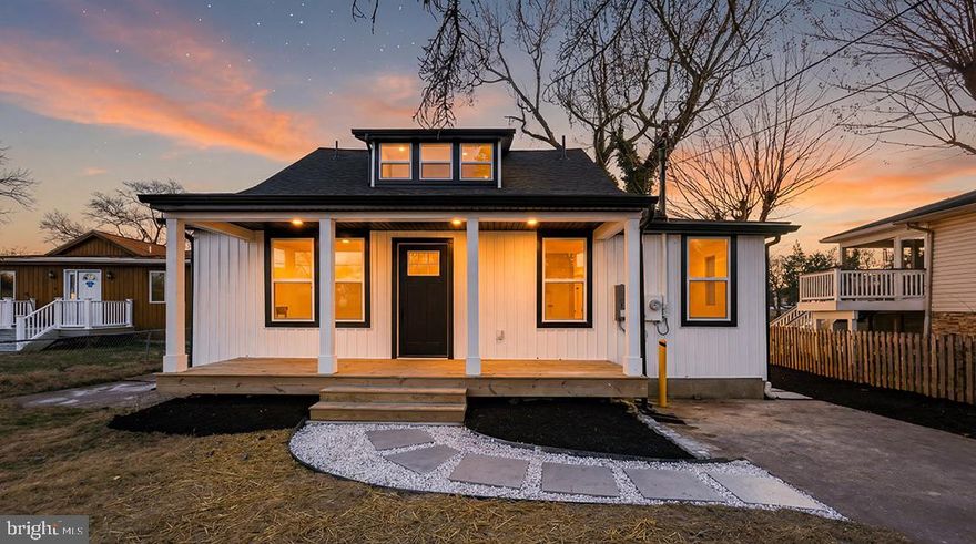 Welcome to 42 Johnson Rd, perfectly positioned on Rock Creek with a private dock and tranquil water views. This home has undergone a complete down‑to‑the‑studs renovation, offering the look, feel, and quality of a new build without the construction time or delays.

Majority of the home has been rebuilt, including new insulation, drywall, electrical panel, roof, windows, board‑and‑batten vinyl siding, porch, deck, and an HVAC system with all new ductwork. The open‑concept floor plan is enhanced by wide‑plank luxury vinyl flooring and abundant natural light.
The designer kitchen is the heart of the home, featuring an oversized island, 42" cabinetry, quartz countertops, and sleek black stainless steel appliances making this house perfect for entertaining and everyday living.

The main‑level primary suite serves as a private retreat with beautiful water views, a spacious walk‑in closet, and a spa‑inspired en‑suite bath with a dual shower. Two additional guest bedrooms and full bath are located on the second level, offering comfort and flexibility.

An unfinished basement provides ample storage and peace of mind with a newly installed French drain. Step outside and enjoy true waterfront living with a private dock on Rock Creek, ideal for boating, kayaking, and embracing the Chesapeake lifestyle.