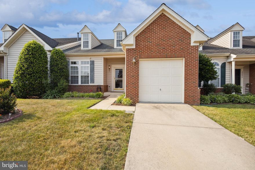 Villa/Townhouse in a 55+ community which includes the use of all facilities in Ashburn Village. The Villa has 3 bedrooms, and three bathrooms on 3 levels with a oversized one car garage. Hardwood floors throughout main level. The primary bedroom suite is on the main level with a large bathroom en suite with dual sinks and a separate shower. This level also has a gourmet kitchen, living room, fireplace, dining room,  half bath and laundry/mud room. Vaulted ceilings and skylights make this level bright and airy. The upper level has 2 bedrooms each with a walk in closet and a hall bathroom. And loft area. The finished lower level has a rec room, full bathroom and den. There is plenty of storage room.  Ashburn Village amenities include the use of the rec center, swimming pools, lakes and ponds, fitness center, and more. Great location - close to One Loudoun, shopping, entertainment and across the street from the new senior center.