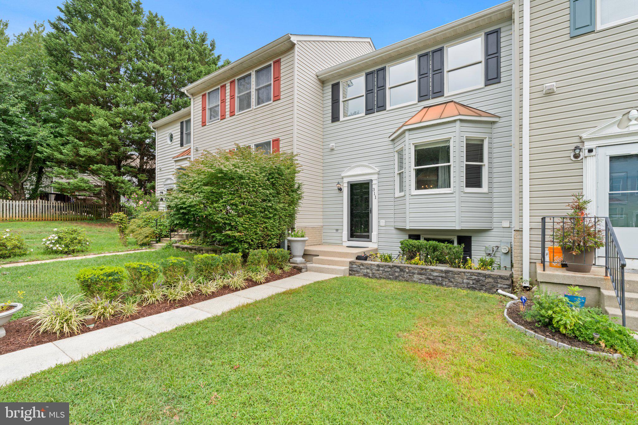 311 SLOPING WOODS COURT