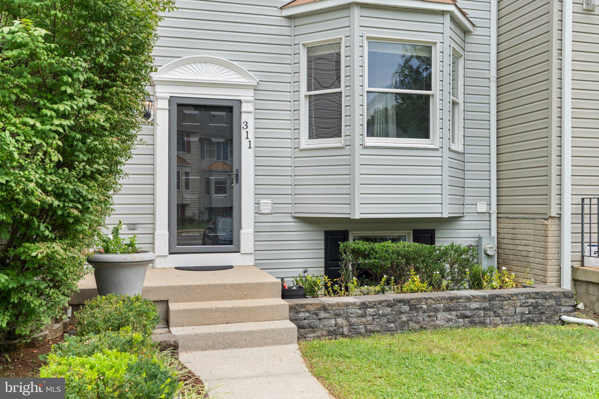 311 SLOPING WOODS COURT