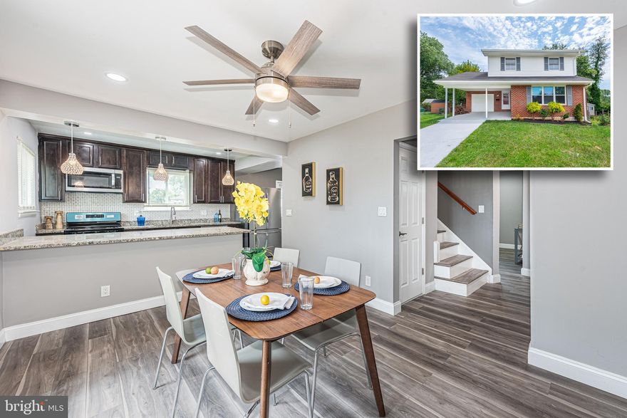 BEAUTIFULLY DESIGNED RENOVATED COLONIAL WITH OVER 2,300 SQ. FT. OF LIVING SPACE!  Features include wood flooring throughout the main level, a spacious living room, separate dining room, kitchen with ss appliances & granite counters, a main level half bath, upper level Primary bedroom suite with a full bath, and 3 additional bedrooms with a hall bath, a fully finished basement with a large family room, 5th bedroom, and 3rd full bath, a rear deck overlooking the large backyard, and a 1 car garage with additional driveway parking!  Conveniently located minutes from tons of shopping, restaurants, and major roadways!