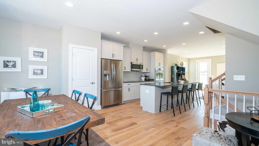 MILLVILLE 22' Wide Townhome- 
 FALL MOVE IN!  Estimated September Delivery!!  Start Your New Chapter in a Move-in-Ready Home.  **UP TO $15,000 IN CLOSING COST ASSISTANCE AVAILABLE ON SELECT HOMES, FOR PRIMARY RESIDENCE WITH USE OF APPROVED LENDER AND TITLE!**  Plus, If eligible get up to $10,000 in DOWN PAYMENT ASSISTANCE or GRANT through WVHDF!!!
Welcome to President’s Pointe, an exceptional master planned community, you can enjoy miles of walking trails, clean green space and multiple parks.  We are the ONLY COMMUNITY to be walking distance to the retail center, restaurants, shops, Home Depot and more...Brand NEW Stanley Martin townhome with designer inspired enhancements including a modern, open floor layout, 3 finished levels, 2 car garage, spacious deck, granite and quartz countertops, upgraded cabinetry and beautiful hard surface flooring.  This open and innovative floor plan is conveniently located in Jefferson County, just minutes from Route 9, 15 and 7 for easy commuting.  Presidents Pointe is Jefferson County's newest and latest neighborhood, providing beautiful Townhome and Single Family home options at an incredible value.  Designed with livability in mind, our homes include inviting main levels featuring modern and open kitchens with islands, serene primary suites and spacious recreation areas, perfect for entertaining family and friends.  Convenient location- walk to shops and restaurants.  Open Sunday 12-5,  Monday, Thursday, Friday and Saturday 10-5, Closed Tuesday and Wednesday.  Prepare to make memories that will last a lifetime at Presidents Pointe!