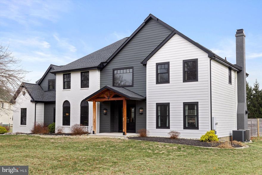 Walk to charming New Hope from a home that is the perfect combination of sleek, modern, and cozy. This renovated home sits on a beautiful, level lot of over one and a half acres with an in ground pool offering a vast amount of space inside and out! Custom features and upgrades abound starting with an elegant entrance featuring Brazilian Walnut beams. The French doors open to an impressive 2-story foyer and open staircase, highlighting the crown molding and wide-plank flooring that is throughout the home. The first floor is ideal for entertaining, offering an open concept layout with the living room adjacent to the large dining room with gas fireplace and double doors leading to the patio. The custom kitchen features elegant  granite countertops, counter to ceiling glass tile, and a spacious center island.  Viking Professional 6-burner gas range, drawer microwave, 150 bottle dual-zone wine cellar and a walk-in pantry behind a custom-built sliding barn door. The first floor also has an office with glass French doors, and wonderfully spacious family/game room . Ascend to the second level to the primary bedroom with tray ceiling, an antique chandelier, and ensuite bath including a walk-in herringbone tiled shower, a soaking tub, and radiant heated floors. Enjoy a  Dressing Room of your dreams! There are 3 more bedrooms including an en suite, as well as a nicely appointed  hall bath on this level. All bathrooms are equipped with full-body vertical shower heads. Outside also offers the ideal space to entertain with two separate paver patios defining your entertaining space along with an inground pool and spa There is also a large, detached structure that can accommodate a small car or be used as a nice shed. New roof, windows and hardy board siding, water heater, HVAC and a water softener ! Fantastic location that is walking distance from downtown New Hope and minutes from the award-winning New Hope-Solebury Schools.