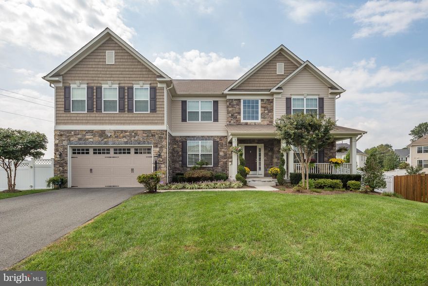 Stunning home w/ 5900 sq. ft. Great for entertaining indoors and out. Lg eat-it kitchen w/SS appliances, granite, large island, 2 -story family room w/stone FP, sunroom, formal dining room and living room. Princess suite w/private bath-3 FB upstairs, MB retreat w/sitting area. Finished Walk out LL w/BR, BA, rec. room, bar, gym. Screened-in porch, Trex deck, lg. yard and fence.