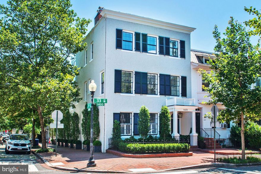 Completely renovated from top to bottom by Cecchi Homes, this beautiful Georgetown home offers high quality, modern finishes. The main level features a Foyer with herringbone hardwood floors, Living Room with marble wood-burning/gas fireplace, Formal Dining Room, Powder Room, Family Room with shiplap walls and access to an outdoor patio,  Kitchen with large center island, stainless steel Wolf appliances, Subzero refrigerator, wine cooler, and Waterworks fixtures. The second level features the spacious Master Bedroom with his and hers closets, Master Bathroom with marble tiling, soaking tub, and Waterworks fixtures. Two additional bedrooms with en-suite bathrooms and walk-in closets complete this level. The top floor offers two bedrooms with en-suite baths, Wet Bar, and spectacular Roof Deck with views of Georgetown. The lower level has 1 Bedroom and full bath, Recreation Room, and Laundry Room. This home also includes an elevator that serves all four stories. One Car Garage included.