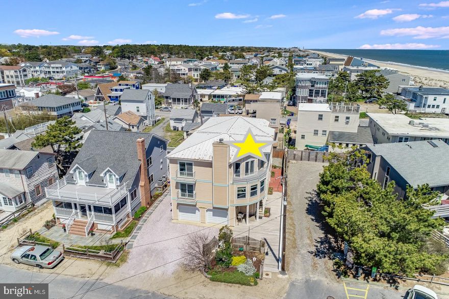 RARE OPPORTUNITY! Introducing The New Orleans, a duplex located only one house from the ocean on one of Dewey Beach’s premier streets. This property consists of two separate 4-bedroom, 3.5-bathroom townhouse units which may be purchased either together or separately. Both units offer ocean views and ample parking, and EACH has an estimated rental potential of $100,000. On the main second-floor living level of each unit, you will find the large living room with a fireplace, the spacious kitchens, dining area, large deck and balconies, and powder room. Both kitchens offer stainless-steel appliances and large walk-in pantries. Lounge on the covered outdoor decks while listening to the ocean waves. The third level features the owner’s suites, complete with generous ocean views and vaulted ceilings. Moreover, each suite features a large, luxury bathroom with ocean views. The suites also contain giant closets, and the SOUTH unit offers an office/sitting area with brand-new carpeting and an additional balcony. Two more bedrooms are located on this level in each unit, both featuring their own private balconies as well as a full shared bathroom and laundry room. The first level of each unit features a bedroom and en suite with private entrance. A large utility room on the lower level houses your tankless water heater, HVAC, and central vacuum system as well as offers room for additional storage. The two-car garage in the SOUTH unit is spacious and features plenty of protected space for cars, bikes, beach chairs, and more. The NORTH unit offers a large carport with plenty of parking. There are extra storage closets located on the exterior of the first level. Plus, there is a shared common area in the back of the duplex for lounging, barbecuing, and relaxing outdoors. Each unit has been freshly painted, and the NORTH unit features brand-new carpeting. These units are being offered fully furnished with some exclusions, and they can be purchased either together or separately. The NORTH Unit is being offered at $1,399,000, and the SOUTH unit is being offered at $1,449,000. A duplex can not be recreated within similar NR district zoning. This is a rare opportunity, so schedule your private tour today!