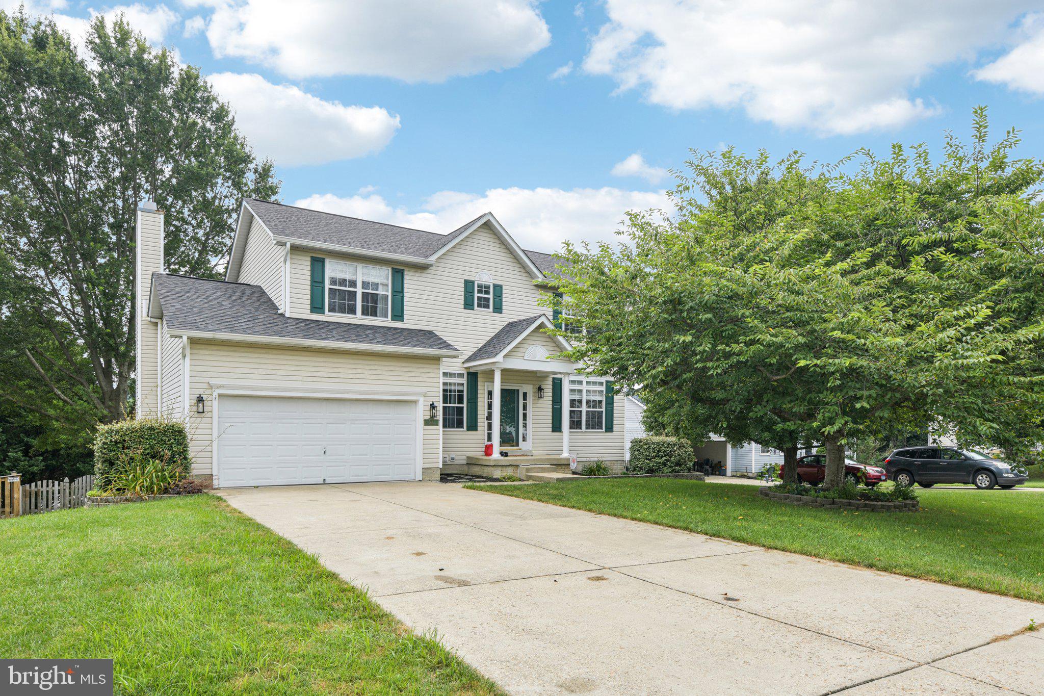 Welcome to this beautifully updated single-family home in the desirable Bayview neighborhood of Chesapeake Beach, MD. Located in a sought after school district and vibrant community, this home offers comfort, charm, and modern upgrades throughout. A large tree graces the front yard, and a two-car garage adds convenience. Inside, enjoy LVP flooring on the main level and basement and abundant natural light from large windows with Roman shades. The kitchen features new appliances, bistro seating, a center island with cooktop, and recessed lighting. A formal dining room and spacious deck overlook the large, fenced backyard—perfect for relaxing or entertaining. The main level boasts a custom built-in bookcase with sliding library ladder and custom trim. The basement includes a built-in entertainment center and a custom office with built-ins. The primary suite offers a walk-in closet and private bath. Recent upgrades include a new roof, HVAC, and water heater—truly move-in ready!