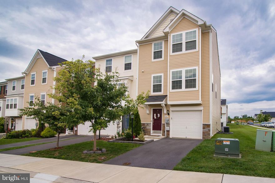 *3 Bedrooms *2.5 Baths *3 Finished levels *End Unit *Newly constructed deck *Gorgeous kitchen with 42" cabinets & island *Great commuter location *Walk to restaurants & shopping *Garage *Common area between homes in back *1st floor family room with 1/2 bath *Immaculately maintained *Over 2200 SqFt *Possible payment of $1012 (P&I) with ZERO DOWN at 4% interest