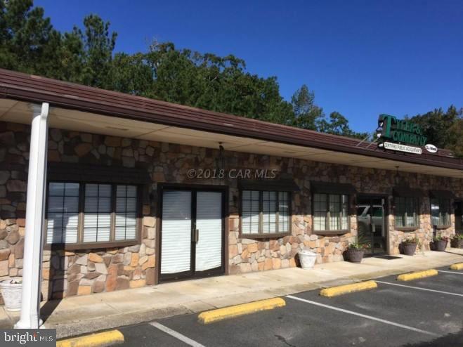 Great Commercial property in extremely high traffic area. 1550 total sq. ft. 2 floors 1st has 1250 sq. ft. second floor has 300 Sq. ft. all completely finished for office space or retail showroom