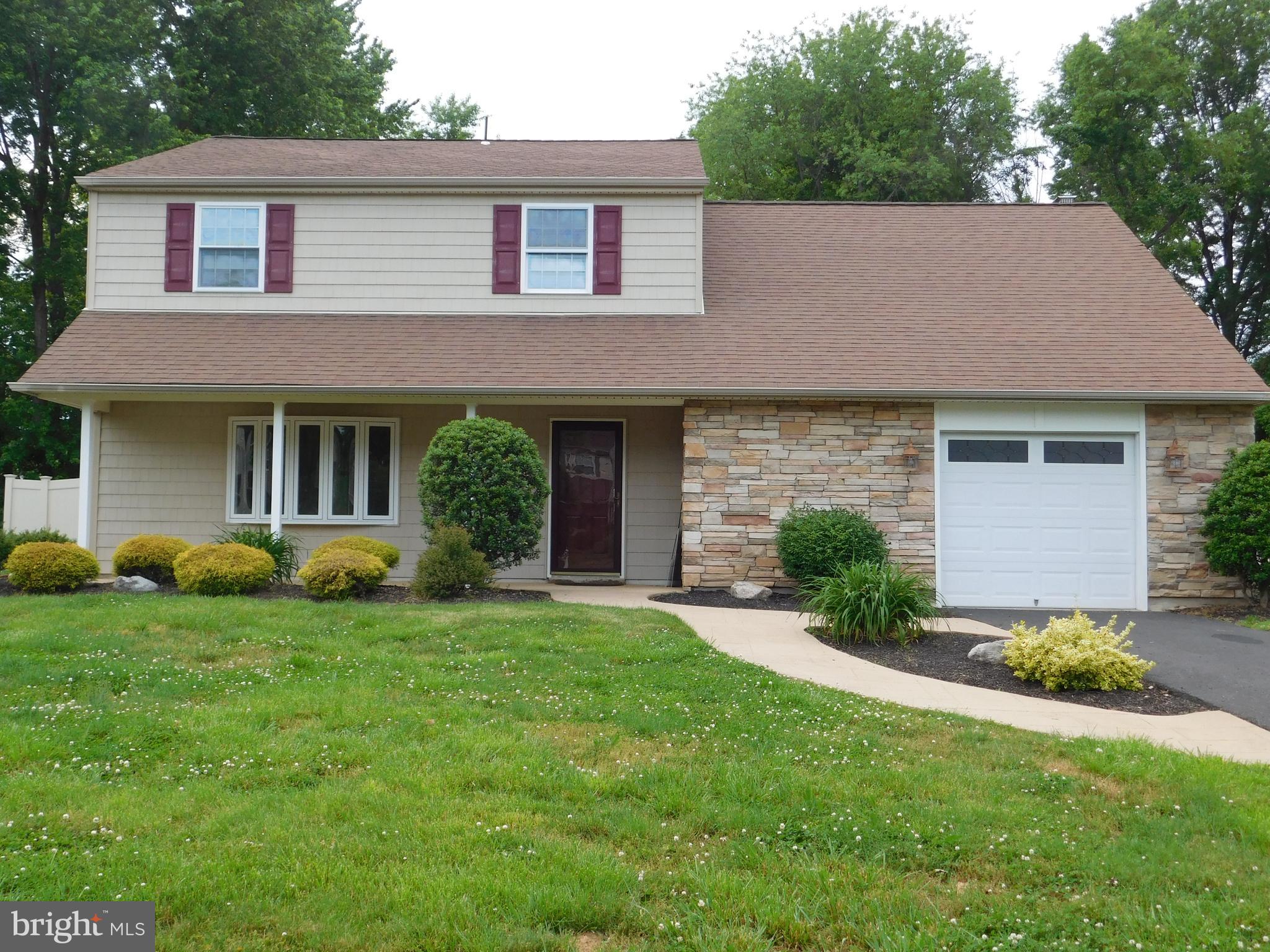 Wonderful 4 bedroom/2.5 bath Colonial in Holland PA located on a cul de sac. This home features hardwood floors, large rooms with lots of natural sunlight, and fresh paint throughout. Entering through the front door you will find a coat closet and half bath to your right. On the left is a large living room with picture window and recessed lighting. The eat in kitchen has a center island, tile floors and back splash, pantry closet, plenty of cabinets and counter space. Off the kitchen is the formal dining room to the left and on the other side is the family room with fireplace and door to back patio. Laundry room is also on the first floor off of the garage. The second floor has 4 spacious bedrooms with ceiling fans and custom closets. The hall bathroom has a tub/shower, radiant heat, and newer vanity. The master bath is fabulous in all white subway tiles, new vanity, and jetted tub/shower. The home sits on almost a full acre and is surrounded by vinyl fencing. Located within Council Rock South and close to all major roadways for easy commute to Philadelphia or NJ. Easy to show and quick settlement possible.