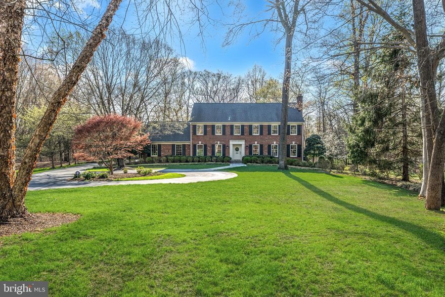 If you are searching for a really wonderful home, this is it!   This exceptional W.C. & A.N. Miller-built, all brick colonial is set on a spectacular two acre  lot in a private cul-de-sac,   just minutes from Potomac Village.  A welcoming circular driveway and lush, professional landscaping lead you to this warm and inviting center-hall colonial.  Inside, the gracious floor plan features generously proportioned rooms, perfect for everyday living and entertaining.  The expansive formal Living Room with floor-to-ceiling windows easily accommodates a baby grand piano, while the elegant dining room - with custom corner cabinets-sets the stage for unforgettable holiday gatherings.  The renovated kitchen is a Chef's dream, offering abundant storage, a center island, a charming breakfast nook with built-in seating, a butler's pantry with a second sink and beverage refrigerator. A coveted mudroom/laundry room is conveniently located off the garage, providing even more built-in storage.   Adjacent to the Kitchen, the comfortable Family Room invites you to relax, surrounded by custom built-in bookcases - the perfect spot to curl up with a good book or entertain friends.  In the warmer months, step into the beautiful screened porch where you will feel completely immersed in nature.  For those working from home, the private home office/library is a dream space with rich paneling, a wet bar, room for a large desk and seating area. You may never want to commute to the office again!  Upstairs, you will find five spacious bedrooms, including a luxurious Primary Suite with a sublime marble bath, soaking tub, and stall shower.  Two additional bedrooms boast renovated en suite bathrooms, while the remaining two share a beautifully updated "buddy bath."  There is an easily accessible attic space from Bedroom #3 --  get creative and make it a  fun Harry Potter-like playroom??  The recently redesigned lower level is an entertainer's delight, featuring a billiard area, a stylish wet bar with an under-counter refrigerator, an oversized recreation room - perfect place to watch the Master's Golf Tournament, a game table space and Bedroom #6 or a possible exercise room and a full bath.   From the main level, step outside into a stunning backyard oasis with a professionally designed flagstone terrace and landscaping including mature crepe myrtle trees.  The expansive lawn is perfect for a friendly game of flag football or soccer, all framed by towering trees that ensure privacy and tranquility.  All of this, plus an unbeatable location just minutes from Potomac Village, Great Falls National Park, Clara Barton Parkway and I-495, the Beltway, offering both convenience and natural beauty.  This is a rare offering - make it yours today!!