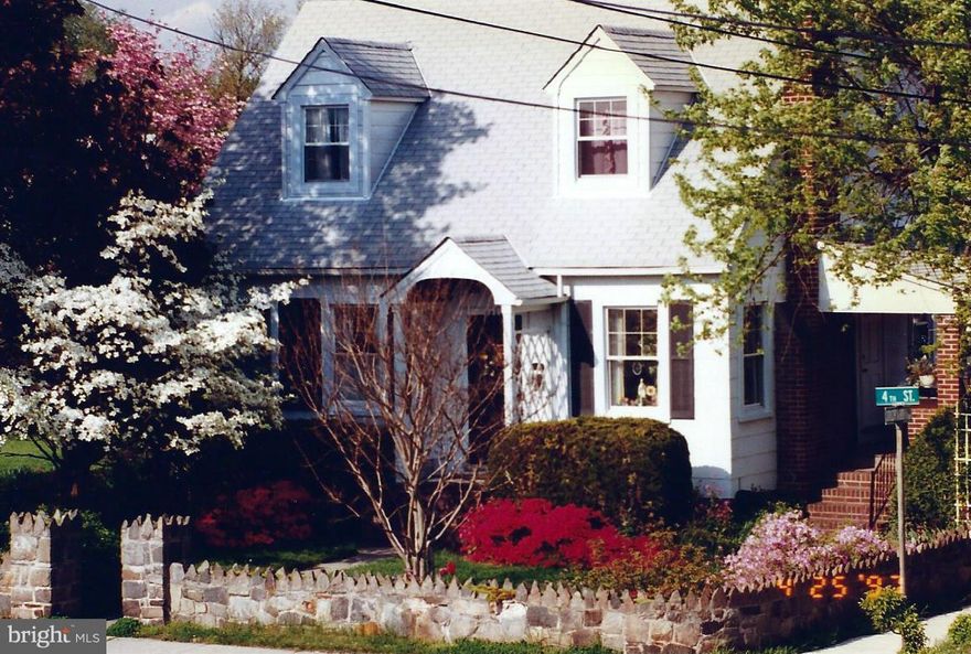 JUST REDUCED 20,000! This home has the unique ability to have a 2 bedroom separate entrance apartment above it, with 2 bedrooms on 1st floor, 2 fireplaces and finished basement! Rent upstairs for approx. 800.00 month. Home is in exceptional condition, fantastic detached 2-car garage, 3 porches, original wood work and door and they look almost new! Nice yard and a 2 car detached garage. CALL TODAY!