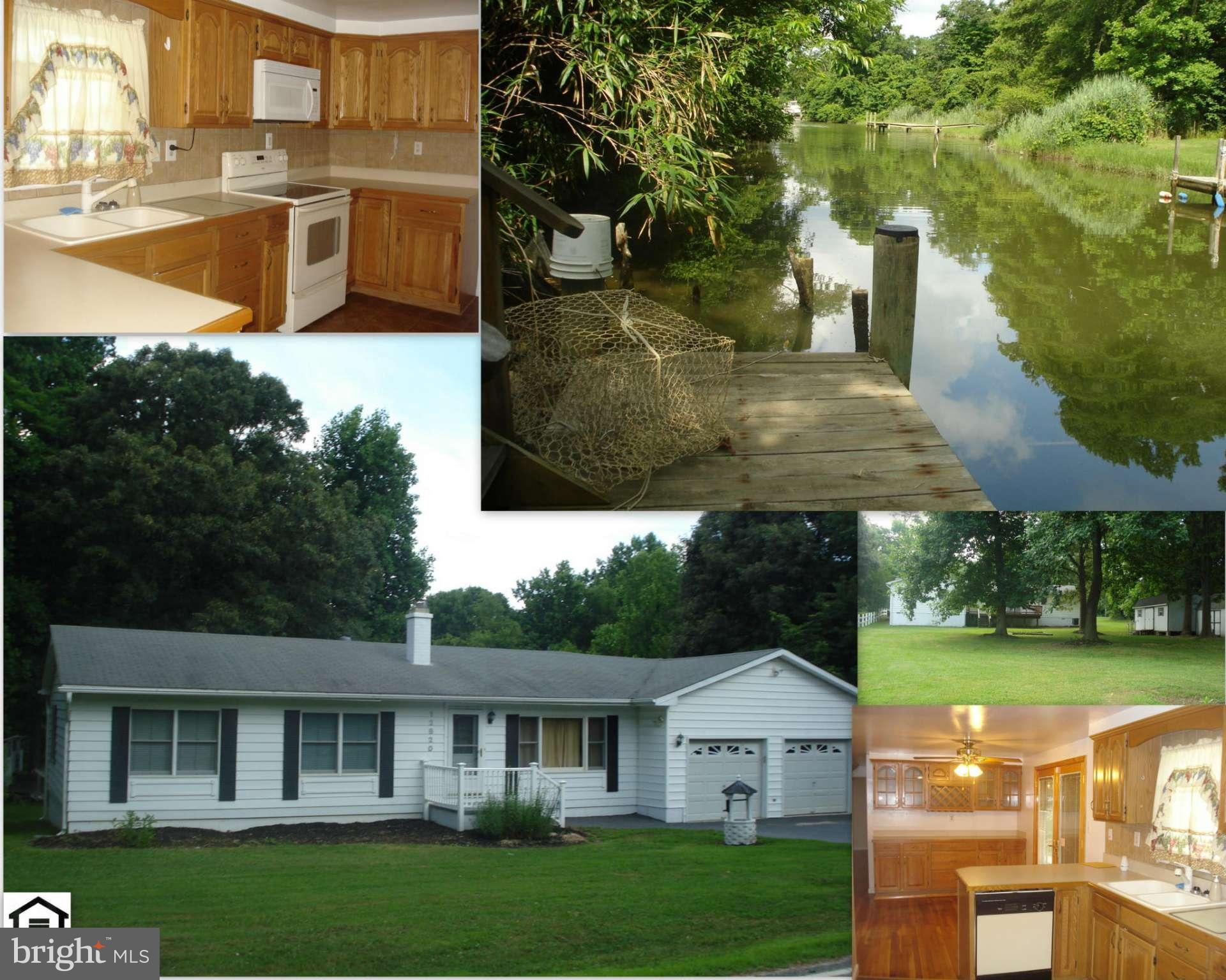 FREE dock and crab pot! One level living in this well maintained home 2 car garage. Hardwood floors throughout, separate dining room with built ins, large bedrooms. 3rd BR is a suite with wet bar, 1/2 bath, surround sound and sep. entrance to the deck. Located on Spring Cove the dock is perfect for launching a boat, crabbing or just relaxing and enjoying the view! The yard is huge with 3 sheds.