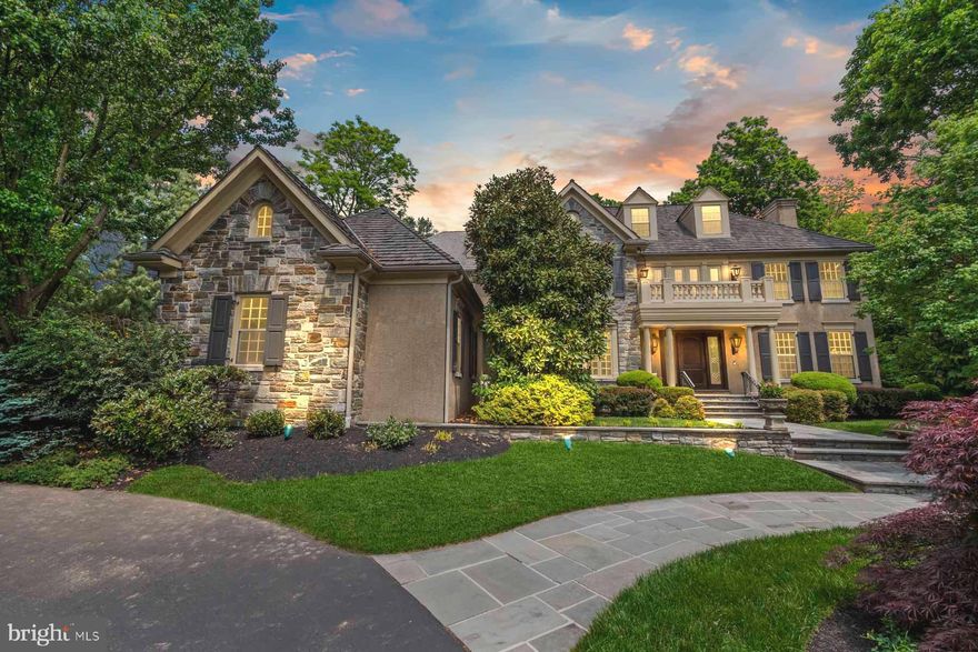 Exceptional C.F. Hollaway 3-story stone Manor Home in desirable Villanova, Radnor Township. Beautiful appointments coupled with exquisite amenities make this elegant home a true gem. Fabulous Woodmode Kitchen, eat area with cathedraled ceiling,   Impressive  step down Family Room with  fireplace and coffered 10 ft ceilings, built ins galore in the Mud Room screened Porch off the kitchen area, lovely sunny Sitting Room,  elegant Dining Room, private paneled Library with fireplace . The large Foyer has an elegant two story Entry  and is open to the sizeable Living Room with fireplace . Second level features a lavish main Bedroom suite with 11 Ft  ceilings and Bath with heated floors, four additional ample-sized bedrooms. Finished third level, perfect for in-law or guests, with a Bedroom, sitting Room and full Bath currently used as home Offices . Add the finished lower Level with Media Room, enhanced with state of the art equipment, area for a gym or play area, Wet Bar with additonal sitting area, loads of unfinished space for storage, oversized three car Garage. A Stunning Open Floor Plan.  Superior location close to shopping and all major roadways and the fabulous Radnor schools. A GEM!