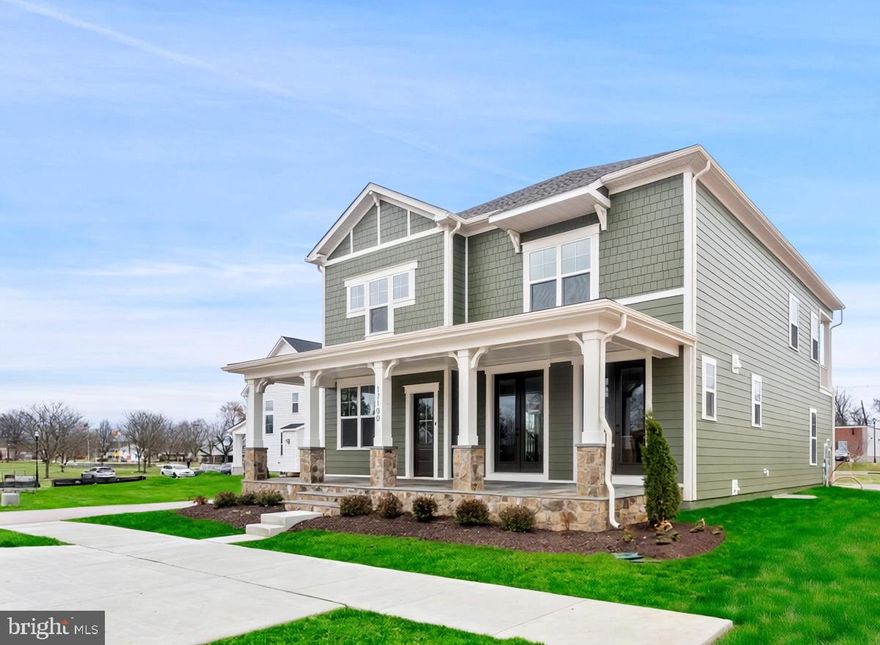 The Veranda at Ferry Crossing

This stunning home features 5 bedrooms, 4.5 baths,  and a 2-car rear-entry garage in the brand-new Ferry Crossing community.

The main level showcases a dramatic two-story foyer, a multi-gen suite with private bath and laundry, and an open-concept kitchen with quartz countertops, upgraded cabinetry, family room with tray ceiling and gas fireplace. Step outside to a full front porch overlooking the park.

Upstairs includes a spacious primary suite with dual walk-in closets, spa-style bath, plus two additional bedrooms, full bath, and laundry room.

The finished lower level offers a rec room with wet bar, guest suite with full bath, and extra storage.

Lawn care included in HOA.