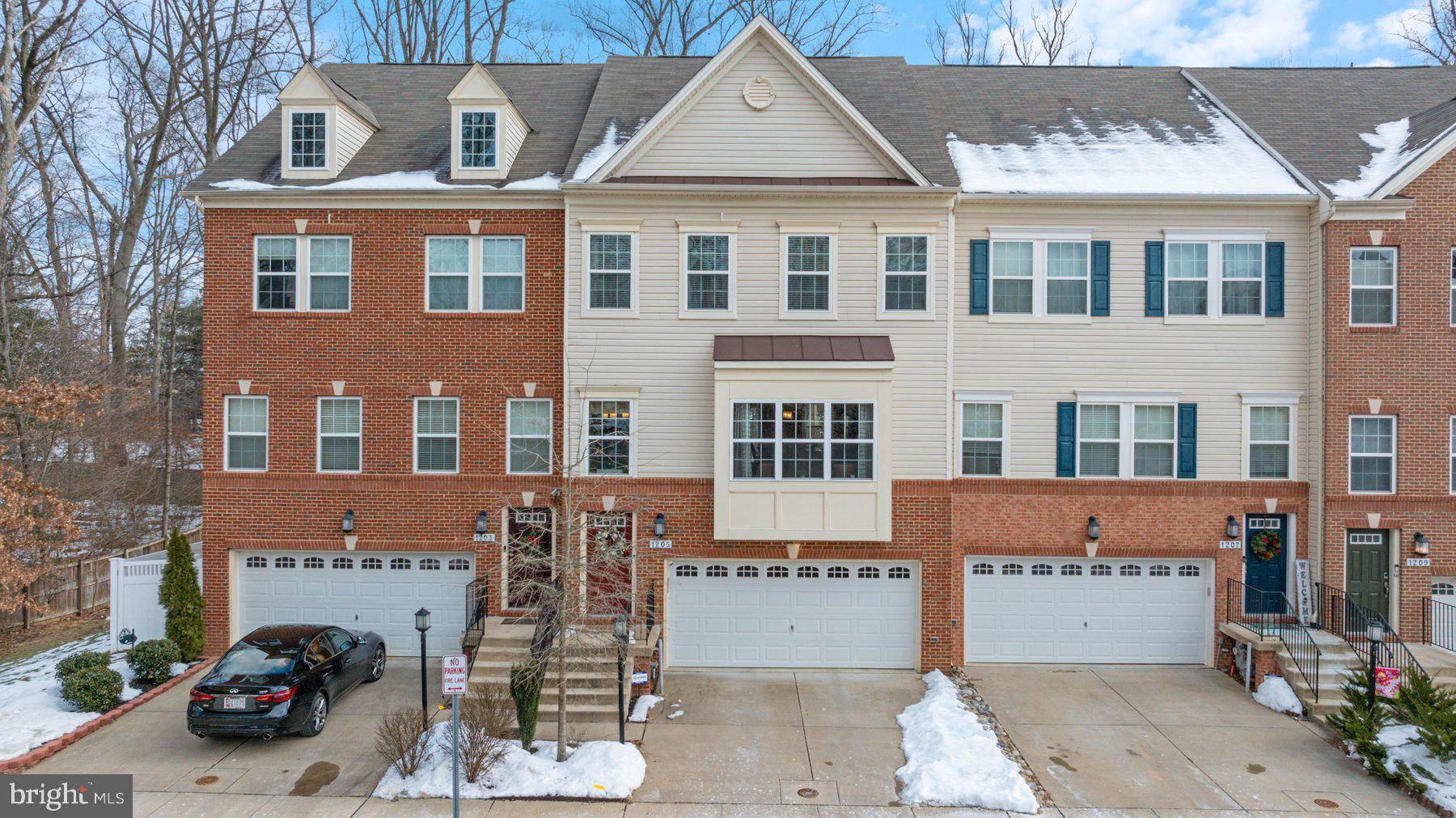 The stunning Easton Model offers 3,044 sq ft of luxury living space spread across all 4 floors. With ample room for everyone, this home is designed for comfort and style. Step into luxurious living at this modern townhome on a premier, desirable lot in the sought-after Summerfield Village! Starting on the first floor, you'll find a spacious recreation room, NEW wood floors, a convenient 1/2 bath, and an attached 2-car garage. The second floor boasts wood floors throughout, upgraded granite counters w/stainless appliances, a gourmet kitchen with a butler pantry, a large walk-in pantry, a wine rack, an elegant living and dining area, a stylish 1/2 bath, and a lovely deck.
Get ready to rest and recharge on the third floor with three comfortable bedrooms and two full baths, including the impressive Owner's Suite with a large walk-in closet, a deluxe bathroom featuring a double vanity, and a separate shower. Explore the fourth-floor loft, an ideal space for entertaining, with an additional 1/2 bath and a large walk-out deck.
Enjoy excellent private rear views from two decks, a rear patio with a fenced-in deck, and a luxurious hot tub. This home has ample closet and storage space.
The community offers a clubhouse, walking/jogging paths, a walking trail to the Village of Waugh Chapel Shopping Center, a dog park, and playgrounds for endless enjoyment.
HOME INCLUDES: a hot tub, an electric fireplace in the basement, and a cozy firepit with chairs perfect for those cool evenings.
You’ll love the easy access to major routes 50, 301, and 97, making this location perfect for commuting.
Discover the elegance and convenience of this remarkable townhome—schedule a viewing today and make 1205 Orchid Road your new home!