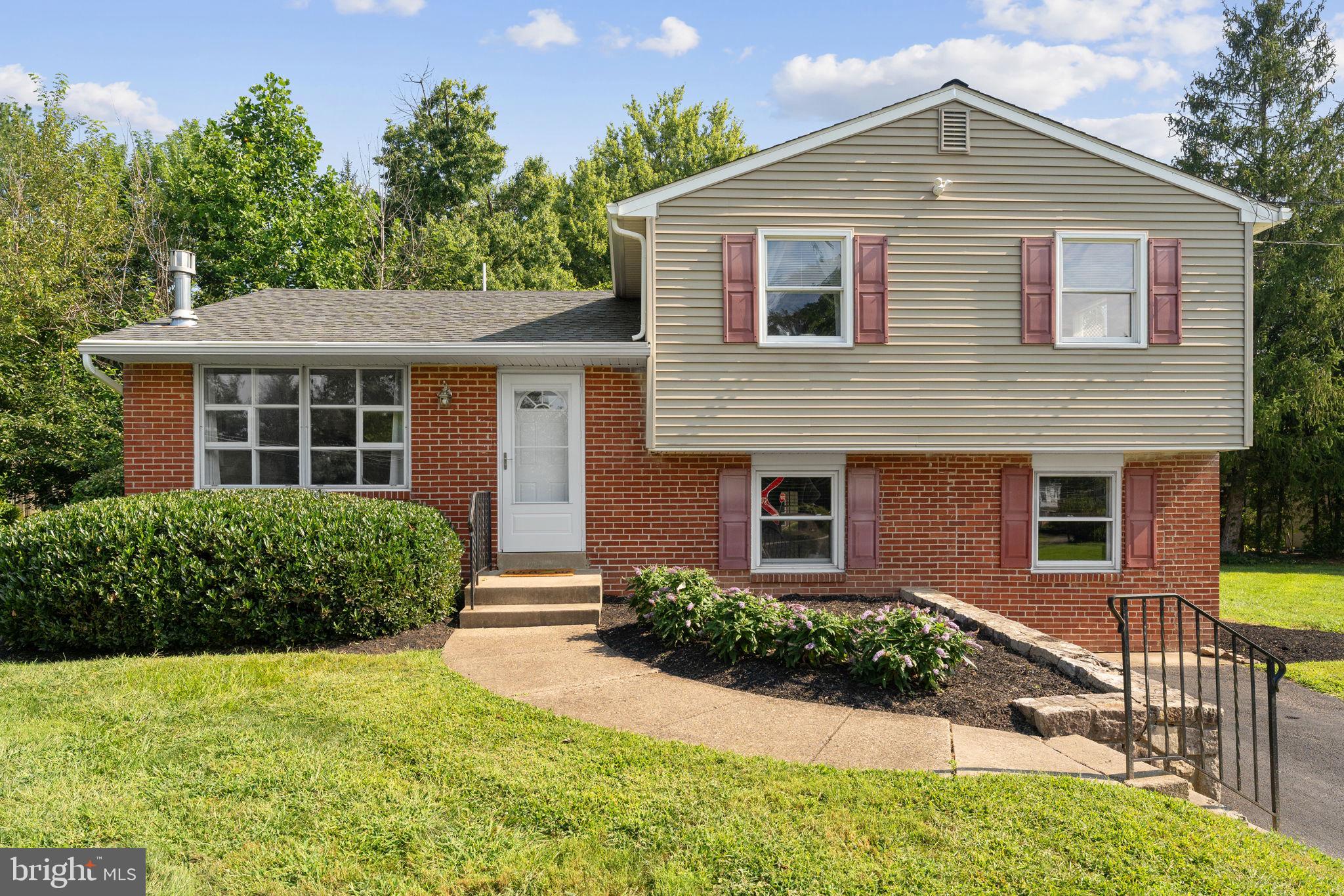 TWILIGHT OPEN HOUSE: THURSDAY, 9/4, from 4-6 PM!
WELCOME HOME to 14 Broadale Road, a beautifully maintained 3-bedroom, 1.5-bath split-level home in the sought-after Sandy Ridge Acres neighborhood of Doylestown Borough!
Located in the award-winning Central Bucks School District, this corner-lot property offers a peaceful setting backed by mature trees and an unbeatable location just minutes from the heart of Doylestown Borough where small-town charm meets vibrant culture. Enjoy downtown strolls to boutique shops, cozy cafes, gourmet dining, historic landmarks, and year-round community events that make Doylestown one of Bucks County’s most beloved destinations.
Step inside to a sunlit living room with hardwood floors, a gas fireplace, and a large front window. The kitchen is the heart of the home, featuring abundant cabinetry with crown molding, a wall oven, stainless steel microwave and sink, dishwasher, and generous natural light. An open cut-out to the dining room, which offers direct access to a large Trex deck, makes entertaining a breeze.
All three bedrooms are bright and comfortable, with beautiful vinyl plank floors, ample closet space, and plenty of natural light. The full bathroom includes a tub/shower combo, and the lower-level half bath adds convenience.
The lower level features a versatile second living area with a wood stove, an abundance of natural light, laundry room with utility sink plus access to the enclosed back porch…an additional outdoor space to enjoy!
Additional highlights include natural gas utilities, a paved driveway, newer roof (2018), a backyard shed, plus an easy commute to major roadways such as 202 and 611.
This home is one you truly won’t want to miss!