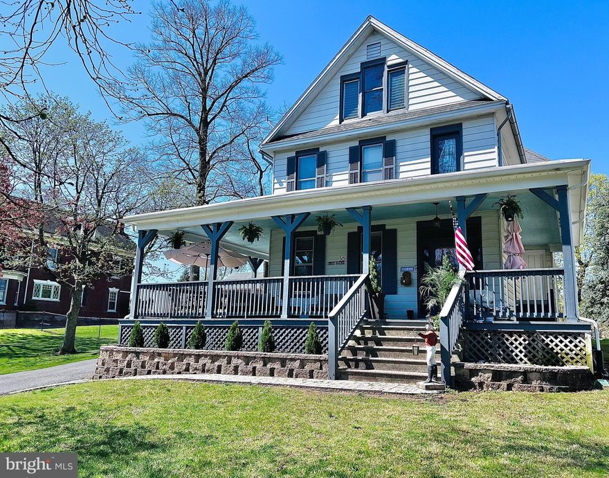 Step into timeless charm and modern comfort in this beautifully updated 4-bedroom, 2-bath Colonial in the heart of Mercersburg on "The Avenue". With over 2,900 square feet of living space, this home blends original character—like hardwood floors, pocket and french doors, and double staircases—with modern upgrades including a modern kitchen with Corian countertops, updated HVAC, and electrical. The picturesque kitchen fireplace and built-in shelves in the main-level study add warmth and functionality. Enjoy quiet mornings on the huge, peaceful front porch, or let pets roam freely in the fenced rear yard. Alley access offers easy backyard entry and potentially even more off-street parking. Nestled on a generous .29-acre lot, this home is located in a friendly neighborhood just a short walk to downtown shops and Lions Club Park. Whether you're searching for a forever home or a charming short-term rental opportunity, 38 Linden Ave offers space, character, and location.