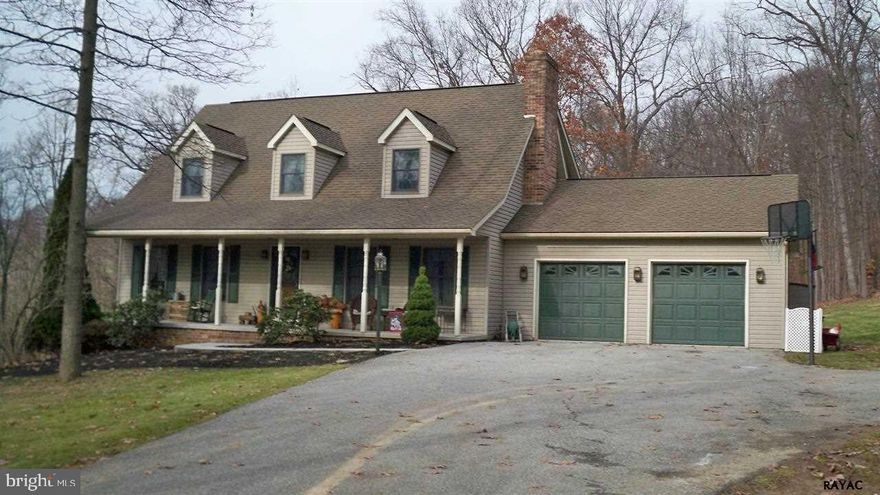 Beautiful, large, meticulously cared for custom built home with 2x6 construction. Gorgeous, rural setting - close to Codorus State Park.  Built-in pool w/diving board & all equipment.  Large, custom oak KIT w/island.  Brick fireplace in DR.  Completely finished lower level w/walk-out which could be separate living quarters, also 4th BR.  35 minutes to Hunt Valley