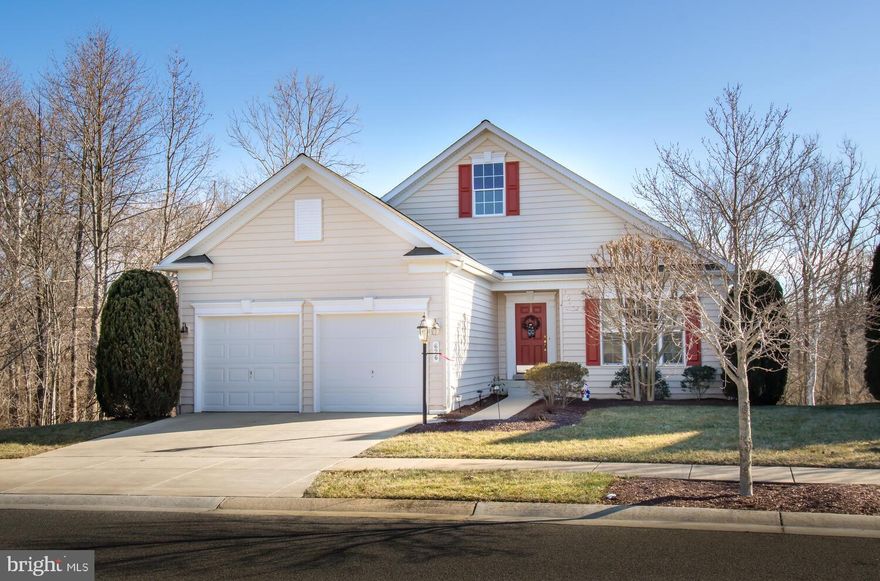 You must see this beautiful Gershwin model home in the most sought after 55+ active adult community in Queen Anne's County.  This home has it all, situated on a corner lot with woods on both the side and rear of the home.

Take a tour and you will be impressed with the beautiful hardwood flooring as you enter the home, a bright office to the right, followed by a private dining room and then finally you reach the unbelievable kitchen/family room combination and the feature wall with the a fireplace and large windows overlooking the wooded area.  The gourmet kitchen features upgraded granite counters, double wall ovens and a gas cooktop.  The master suite, again with beautiful views of the wooded area, features his and her walk in closets, master bath with soaking tub, dual vanity sinks and a separate shower.

The unfinished basement is awaiting the new owners dreams and desires to complete this area as you would like.