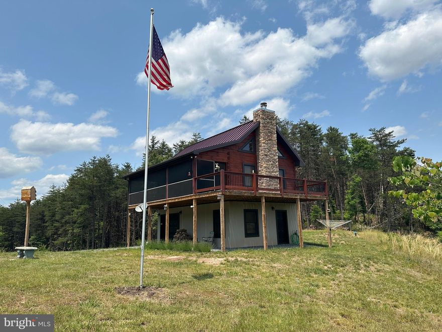HATE TO WAIT? CUSTOM LOG CABIN ON 20 ACRES, BUILT BY BRYSON HOMES, THE AREA'S PREMIER LOG HOME BUILDER. 1000 FT DRIVEWAY EXTENDS FROM THE CUL DE SAC TO THE CABIN, PRIVATELY PERCHED ON A 10 ACRE PLATEAU WITH AMAZING VIEWS OF SOUTHERN MOUNTAIN RANGES AND THE "CLIFFORD HOLLOW BRIDGE" ON CORRIDOR H, THE SECOND HIGHEST BRIDGE IN WEST VIRGINIA. THE CABIN IS SMALL BUT MIGHTY WITH GRANITE COUNTERS, LAMINATE FLOORING, WOOD BURNING FIREPLACE AND AWESOME SCREENED PORCH FOR WILDLIFE VIEWING. BIG ENOUGH FOR A COUPLE AND A FEW GUESTS, YET NOT TOO MUCH TO MAINTAIN. THE 20 ACRES IS COMPRISED OF A FLAT 10 ACRE RIDGE TOP, STEEP CLIFFS AND "CLIFFORD RUN" FLOWS THROUGH A CORNER OF THE PROPERTY. OWNER REPORTS EXCELLENT HUNTING FOR A VARIETY OF WILDLIFE AND THERE'S PLENTY OF SPACE TO SHOOT.  LOCATED IN THE PRESTIGIOUS 10,000 ACRE GATED COMMUNITY OF ASHTON WOODS, THE PREMIER MOUNTAIN COMMUNITY OF THE EAST. ASHTON WOODS IS AIRBNB FRIENDLY, TURN THIS CABIN INTO YOUR PERSONAL ATM MACHINE$$$$. SUPER SECLUSION & PRIVACY, YET ONLY 3 MILES OFF 4 LANE HIGHWAY.....ONLY 15 MINUTES FROM MOOREFIELD.....WAL MART, SCHOOLS, RESTAURANTS, THEATER.....40 MINUTES FROM SKI RESORTS....15 MINUTES FROM MULTIPLE ACCESS POINTS ON THE SOUTH BRANCH OF THE POTOMAC RIVER......30 MINUTES FROM WORLD CLASS TROUT STREAMS AND 10'S OF THOUSANDS OF ACRES OF THE GEORGE WASHINGTON NATIONAL FOREST.....COMMUNITY OFFERS PRIVATE ACCESS POINT TO NATHANIEL MOUNTAIN WILDLIFE MANAGEMENT AREA, 10,000 ACRES OF PUBLIC HUNTING & HIKING......ALL OF THIS WITHIN AN EASY 2 HOUR DRIVE FROM NORTHERN VIRGINIA......TIRED OF LOOKING AT MOUNTAIN PROPERTIES 5 MILES BACK A PIG PATH? YOU CAN GET HERE IN A PORSCHE OR PRIUS! IF YOU'VE BEEN LOOKING FOR THAT PERFECT LOG CABIN IN THE MOUNTAINS THAT WON'T BREAK THE BANK.....IF YOU DON'T WANT TO HAVE TO WAIT A FEW YEARS AND DEAL WITH THE HEADACHES OF THE BUILDING PROCESS....THIS IS YOUR OPPORTUNITY TO HIT THE EASY BUTTON AND HAVE A PRACTICALLY BRAND NEW CABIN FOR AT LEAST 50K CHEAPER THAN WHAT YOU COULD BUY THE LAND AND REPLICATE IT FOR....THESE ARE FACTS! THIS DECISION IS A NO BRAINER.....A NEW CABIN....CHEAPER THAN WHAT IT WOULD COST TO REPLICATE....WITHOUT GOING THROUGH THE BUILDING PROCESS.....PICK UP THE PHONE AND MAKE THE CALL!