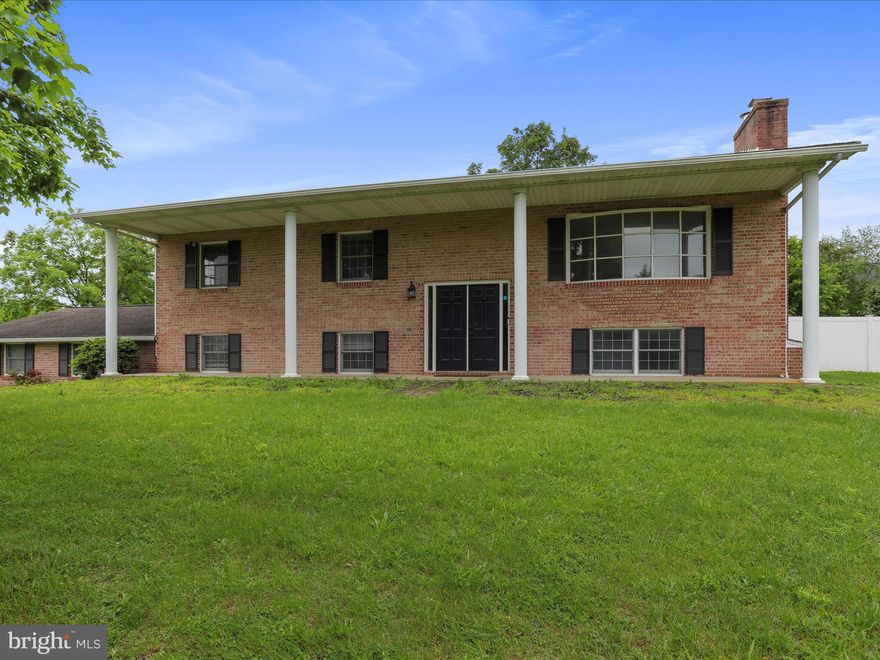 Welcome to 136 Kimberly Dr—Spacious Home on Corner Lot in Sought-After Martinsburg Neighborhood! This solidly built brick home boasts 5 bedrooms, 3 full bathrooms, and an oversized 2-car garage. Located on a large corner lot, the property features a welcoming covered front porch with stately columns and a double-door entry.
Inside, the home offers a generous and flexible floor plan with over 2,800 finished square feet. The main level features bright, open living areas. The fully finished lower level includes multiple bedrooms and a full bath, making it ideal for extended family, guest accommodations, a home office, or even an in-law suite. Brick fireplaces on both levels add warmth and character to the space.
Enjoy the spacious rear deck—perfect for outdoor dining, relaxing, or entertaining. The fully fenced backyard offers privacy and plenty of room for activities. The oversized two-car garage provides ample storage and workspace, while the large paved driveway adds even more parking options.