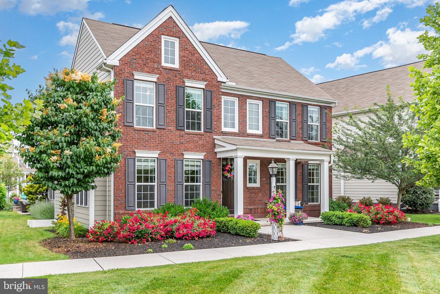 Enter into a world of luxury in Walden with this immaculate home nestled on a picturesque lot. As pristine as a new build, this residence offers the epitome of elegance. The Walden community sets the stage for an idyllic lifestyle, boasting a welcoming neighborhood with a host of nearby amenities and establishments including a cozy restaurant, charming pizza parlor, inviting pub, artisanal coffee shop, Pilates studio, state-of-the-art gym, refreshing pool, lush park, exclusive clubhouse, enriching daycare-learning center, pampering dog grooming facility, sophisticated salon and much more! The main level welcomes you with an open floor plan, a sunlit family room, a practical mudroom/laundry room adjacent to the two-car garage, and a powder room. The gourmet kitchen is a chef's dream equipped with top-of-the-line appliances. Indulge in the opulence of a first-floor primary suite that features a garden tub, a grand spa-like shower and a deluxe walk-in closet with custom cabinetry. Upstairs, discover three bedrooms, a versatile loft area and a full bathroom. Unwind on the serene front porch or the peaceful rear patio to enjoy your evenings. This home is a gem that exudes sophistication - an opportunity not to be missed!