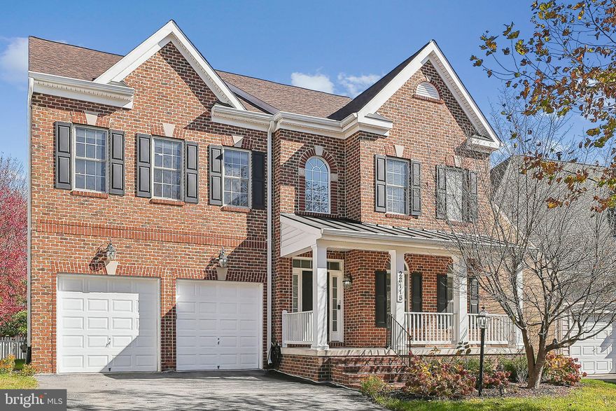 Open house cancelled!! Welcome to this exceptional five bedroom single-family home located in the desirable Arora Hills Community of Clarksburg, where luxury and comfort converge for an extraordinary lifestyle. Enter through the grand 2-story foyer, adorned with elegant three piece crown molding, and be greeted by gleaming hardwood floors that extend through the main level. The traditional living and formal dining rooms create inviting spaces for gatherings, while the gourmet kitchen awaits, perfect for any chef. This expansive kitchen features an extended center island, quartz countertops, gas cooktop, double wall ovens, built in microwave, hood vent (external ventilation) and a spacious walk in pantry. Off the kitchen is the screened-in porch with built in TV, light fixtures, outdoor heating system and the best part is that the porch is constructed of Trex boards and vinyl railings which means low maintenance!
The centerpiece of the home is the open concept family room with tall ceilings, highlighted by a dramatic gas fireplace and large windows that bathe the space in natural light. An additional main-level office/den/study provides a quiet workspace for those working from home. 
Upstairs, the primary bedroom is a massive private retreat with a cozy sitting area, updated lighting, crown molding, recessed lights, tray ceilings, tons of windows, two walk-in closets, and an elegant primary bath featuring dual vanities, a large stall shower, separate soaking tub, and private commode. Two more bedrooms share a Jack & Jill bathroom, another large bedroom with en suite full bath, upper level laundry room and linen closet complete this well designed upper level. 
The finished walk-out basement offers even more space to entertain, relax and unwind. It includes a recreation room, ample storage, high top bar space, an additional bedroom, and a full bath, with a walk-out to a backyard patio that blends indoor and outdoor living. Situated on a lot backing to woods offers natural privacy and a serene atmosphere. In the spacious 2 car garage, you will find storage shelves and a level 2 Tesla charger. Recent capital improvements: Dual Zone HVAC systems, both units (May 2022) Dishwasher (July 2024) garbage disposal (June 2024) Roof with 30 year architectural shingles (October 2022) Oversized gutters and downspouts (October 2022) Arora Hills offers the best of Clarksburg living and  boasts a wealth of amenities, including clubhouses, swimming pools, playgrounds, and jogging trails. Conveniently located to tons shops and dining, and a short drive from Black Hills Regional Park, Prime Outlet Mall, and I-270, this home offers effortless access to everything you need. Don’t miss the chance to call this exceptional brick front colonial your own. Schedule a viewing today and start imagining a life of comfort, style, and cherished memories here!