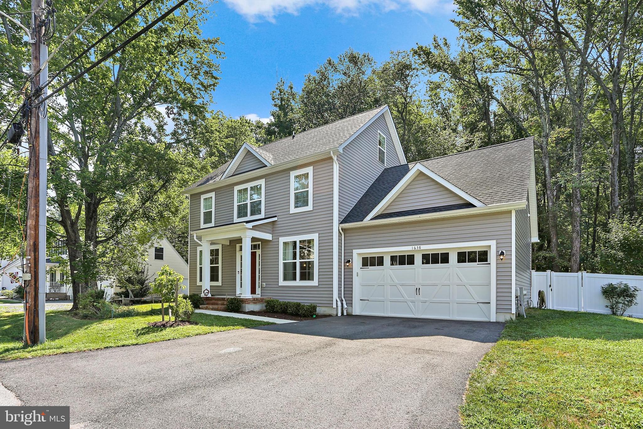 Located in the sought-after water-oriented Cloverlea community of Beverley Beach, this stunning Colonial built in 2023 blends modern comfort with timeless coastal charm. Situated on a rare double lot, the home offers 5 spacious bedrooms and 3.5 bathrooms across three beautifully finished levels. Step inside to an open-concept main level that’s perfect for entertaining, featuring generous living and dining areas filled with natural light. The second floor boasts 4 bedrooms and 2 full baths, including a luxurious en suite in the primary bedroom. A private fifth bedroom with a full bath is located on the third level, ideal for guests, a home office, or a flex space. Enjoy outdoor living on the expansive composite deck, all within a fully fenced backyard with wooded views enclosed by low-maintenance vinyl fencing. Enjoy the convenience of being just a short walk from the marina, Chesapeake Bay, Beverly Beach, and the community boat ramp.