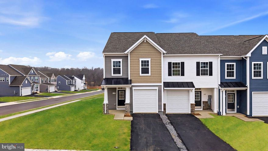 Early 2026 Delivery! Brand new construction of the in Berkeley County’s Premier Planned Community featuring a clubhouse, swimming pools, walking trails, lush landscaping, mountain views and more! 
****NOW OFFERING UP TO $10,000 IN CLOSING COST ASSISTANCE  FOR PRIMARY RESIDENCE WITH THE USE OF APPROVED LENDER AND TITLE*** CONTACT CO-LISITING AGENT FOR ADDITIONAL INCENTIVES.
The Litchfield II is a spacious 2 level townhome floorplan with 3 Bedrooms, 2.5 Baths, and 1 car garage. It features a beautiful foyer with tray ceiling, powder room, and a family room that is open to the kitchen and dining room. The kitchen features level 3 soft closes cabinets and level 3 quartz countertops with stainless appliances, pantry and a large 8’plus island. The staircase with 2 landings leads you to the upstairs where there is room for a reading nook or decorative area. The large primary suite includes a large walk-in closet, dual vanity, and oversized seated, tiled shower with frameless shower door in primary bath with a linen closet. Secondary bedrooms are generously sized. Laundry is located on the bedroom level. Home and community information, including pricing, included features, terms, conditions, availability and sales procedures related to appointments subject to change without notice. All images are for illustrative purposes only and individual homes, amenities, features, and views may differ. Images may be subject to copyright.