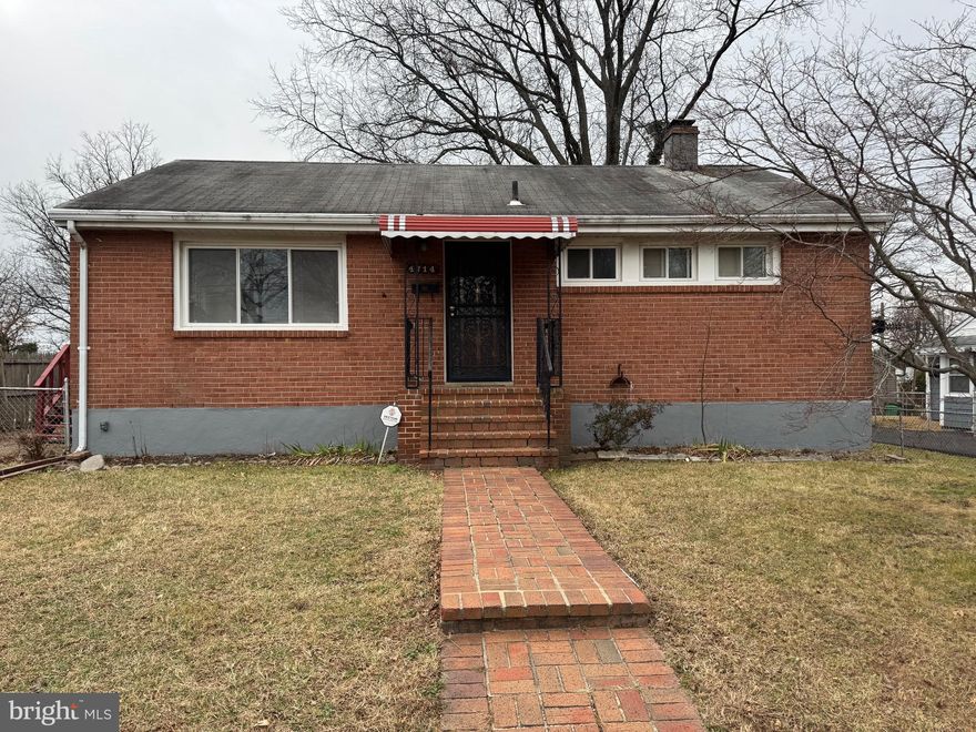 Don't miss this opportunity to own a detached brick home for less than condo prices.  It has hardwood floors,  and an open airy floorplan. With a bathroom on each level and plenty of room to expand your living space  in the full basement, this home can easily accommodate a growing family. You can't beat this super convenient, sought after location.  It's close to the Beltway; Rt 50; and the BW Pkwy, providing an easy commute to DC and most areas in the DMV.  No car. No problem.  This house is close to public transportation and shopping.
Don't sleep on this one!