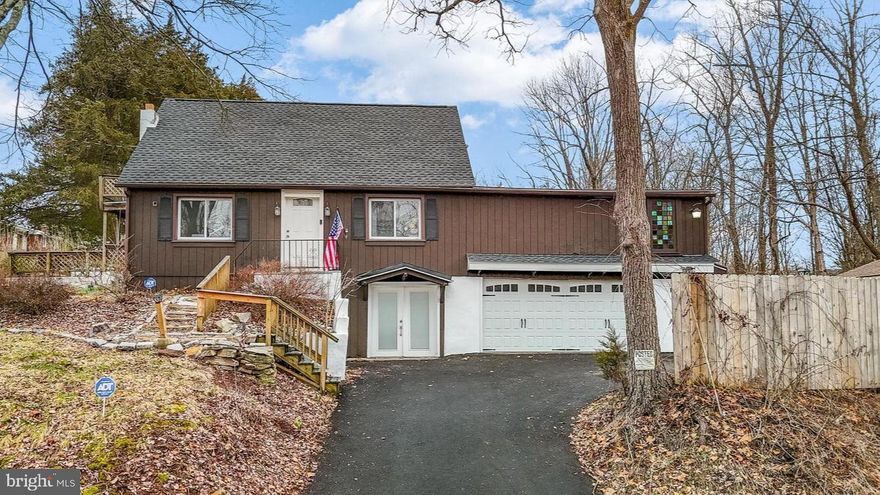 Nestled in the rolling hills of Upper Hanover Township, this spacious 4-bedroom, 2-bath single-family home offers comfort and peace of mind with several important updates. The roof was replaced in 2023, and a brand-new hot water heater was installed in 2026. Even better, the solar panels will be fully paid off at closing, allowing the new owner to enjoy the benefits of renewable energy without the added expense.
With 3,349 square feet of living space, this home is deceptively large and filled with unique features that elevate the living experience. The expansive great room features soaring 9+ foot ceilings, creating a bright and airy atmosphere. The main-floor primary suite is a true retreat, and includes a private remodeled bathroom, walk-in closet, and French door entry.
The kitchen offers a large wraparound counter that opens to a spacious dining room featuring a wood-burning fireplace, cathedral ceiling, and access to the side patio—a great space for entertaining. The first floor also includes a large full bathroom and convenient laundry area. Architectural details such as a masonry arch and curved wooden door add character and charm throughout the home.
Take in views of the Green Lane Reservoir from the deck while enjoying the peaceful setting of the surrounding rolling hills. This home presents a fantastic opportunity to add your own updates and make it truly your own in a sought-after location.
Professional photos will be available 3/17/26