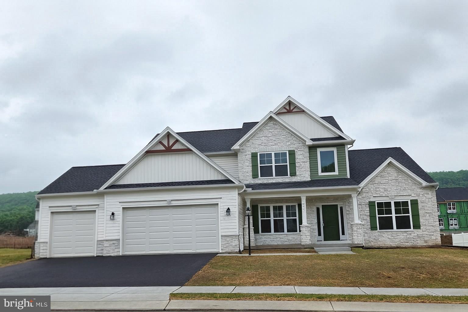 Discover timeless design and modern convenience in the highly desirable Wilshire Estates community. The Martha’s Vineyard model will be built on a nearly ½-acre cul-de-sac homesite in the Central Dauphin School District, offering a walk-out lower level, oversized 3-car garage, and nearly 3000 square feet of living space!
This flexible floor plan provides the opportunity for two owner’s suites—one on the main level and one upstairs—ideal for multigenerational living or guest accommodations. A luxury kitchen package includes 42" cabinetry, quartz countertops, stainless steel appliances with wall oven and cooktop, and a vented range hood. The great room centers around a gas fireplace with slate surround and custom mantel, while 9’ ceilings, coffered and tray ceiling details, and upgraded trim add elegance throughout.
Additional features include durable luxury vinyl plank flooring, upgraded lighting, Moen plumbing fixtures, and a spacious walk-out basement is ready for future finishing. Built by McNaughton Homes, this property exceeds today’s energy codes, offering both efficiency and comfort. Conveniently located near shopping, dining, parks, and everyday necessities, this home combines quality craftsmanship with a prime location. Inquire to learn more today about how you can make this your Next Home!