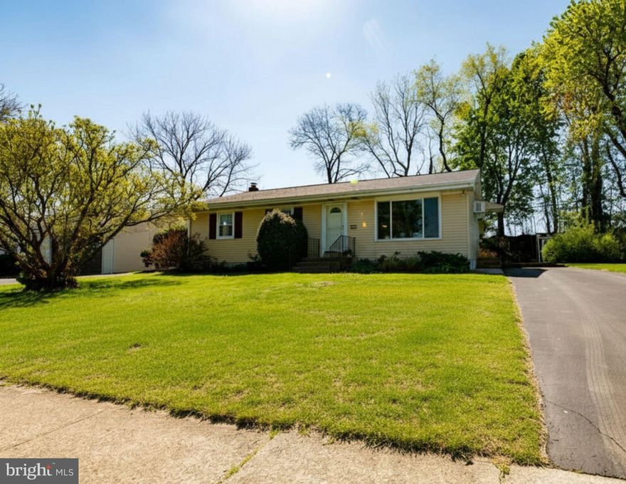 This updated and meticulously maintained ranch home is ideally situated in a prime commuter location in the Lehigh Valley. Just minutes from Routes 222, Interstate 78, the Pennsylvania Turnpike, as well as shopping and dining, the home offers both convenience and comfort.
Lush, mature trees border the private, fenced backyard, which overlooks adjacent farm fields and creates a peaceful setting for outdoor living. The screened porch offers ample space for both dining and lounging. A shed will accommodate storage and gardening supplies.
The 2023 roof, gas boiler and gas hot water heaters, along with public water and sewer provide worry-free and economical living.  Gleaming hardwood floors extend throughout the first floor, where large, bright rooms feature crown molding and abundant natural light. The renovated kitchen offers generous wood cabinetry, an expensive granite counter with ample workspace, and gas cooking.
A modern full bath is located on the main level. The lower level provides excellent expansion space and includes a powder room, a family room area with a built-in bar and refrigerator, as well as laundry and storage.
Located in the sought-after East Penn School District, this solidly built, move-in-ready home is ready to welcome its next owners. Offered for $340,000