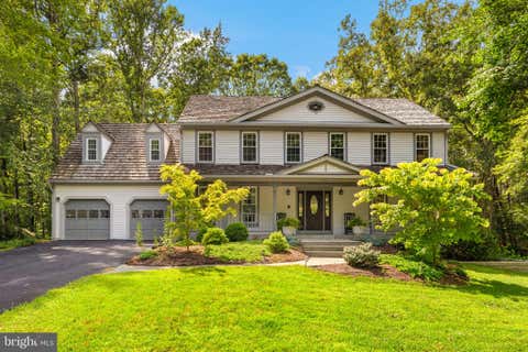 Photo of 9730 Rolling Ridge Drive, FAIRFAX STATION, VA 22039 (MLS # VAFX2335786)