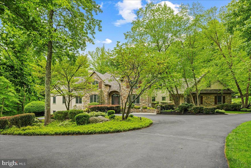 Welcome to 22 Great Hills Road, New Hope, PA & Jericho Mountain Estates! This community is arguably one of THE premier locations in Bucks County. Nestled at the top of Great Hills Road sits this gorgeous custom built 5 bedroom, 3 full and 3 half bath home designed and constructed by Artesian builder Richard Zaveta.  No detail of this stunning estate property has been overlooked! The long winding driveway circles in front of the main entrance where the blue stone walkway, natural cut local stone exterior and solid mahogany wood door greet all that visit. Just inside the main entrance is a large foyer area with plenty of space to greet your guests. One of the first things you'll notice is the incredible amount of mill work, including brand new QUARTER SAWN Red Oak wood flooring, & superior finishes used to create this architectural masterpiece. There is also extensive stonework t/o the first floor. To the immediate left of the foyer is the formal LR with propane gas FP. Flanked to the right of the foyer is the incredibly large DR, perfect for large gatherings. Exiting the foyer and to the right is a staircase leading to the 2nd level. To the left is the 1st floor main bedroom suite & NEW opulent main bath complete w/ custom cabinetry, heated flrs, oversized shower w/ custom glass enclosure and Rohl fixtures. There are also 2 walk-in closets in the suite and a first floor study just outside the Main BR area that complete this wing of the house. Perhaps the most enjoyed space in any home are the kitchen and great room areas. Without exception, this Great Hills Rd property offers plenty of memorable moments. The gourmet culinary kitchen w/light drenched breakfast room offers granite counters, high end appliances like Decor, Subzero & Bosch, raised panel cabinetry, quarter sawn red oak hardwood floors, large center island & wine bar with wine cooler and automatic ice maker.  The open floor plan continues and off the kitchen area are 2 more large rooms to enjoy. There is the stunning and cozy great room with locally quarried floor to ceiling stone FP with raised stone hearth and more red oak flooring.  Immediately adjacent to the great room is the very large sunroom w/ vaulted ceiling and walls of windows with views of the rear yard & pool.  A lovely powder room, numerous closets, kitchen pantry and 1st floor laundry room complete this level.  Upstairs are 4 additional BR's, one that is ensuite and has an enormous closet, and 2 others w/ shared bath and generous size walk-in closets. There is also a 5th BR that is currently used as a music room. The 3 bedrooms all have new Masland carpeting & are rarely used.  The 5th BR / music room and hallways all have new red oak flooring.  The walk-out lower level is spectacular.  It includes a counter bar area, lounge and game room/exercise space.  But the highlight of this level is the newly installed 750 bottle wine cellar w/ high end refrigeration and SS racks! In addition, there is plenty of unfinished room on the other side of the basement. Are you ready to step outside? This IS the nicest backyard in Bucks County! It's "Ritz Carlton" like with multi-tiered patio, stone retaining walls, custom landscaping, large custom in-ground pool w/ spa, infinity edge, multiple water stone waterfalls, gas fire pit area and several gas volcano pillars to give elegance and resort feel to nighttime entertainment.  All of this and a 26 x 26 stone & cedar cabana house, full kitchen w/ built-in grill, changing room and 1/2 bath. In case you're wondering, there are stunning outside views of the pool, patios & woods from almost every room in the house. Other must know features include new HVAC, new water softener & reverse osmosis system in kitchen, new GAF Camelot architectural series roof w/ ice shield, new Sonos 6 zone system, alarm system/cameras, professional grade router system, 3 car garage & freshly painted interior. Award winning Council Rock Schools. One of the finest luxury homes in Bucks County!