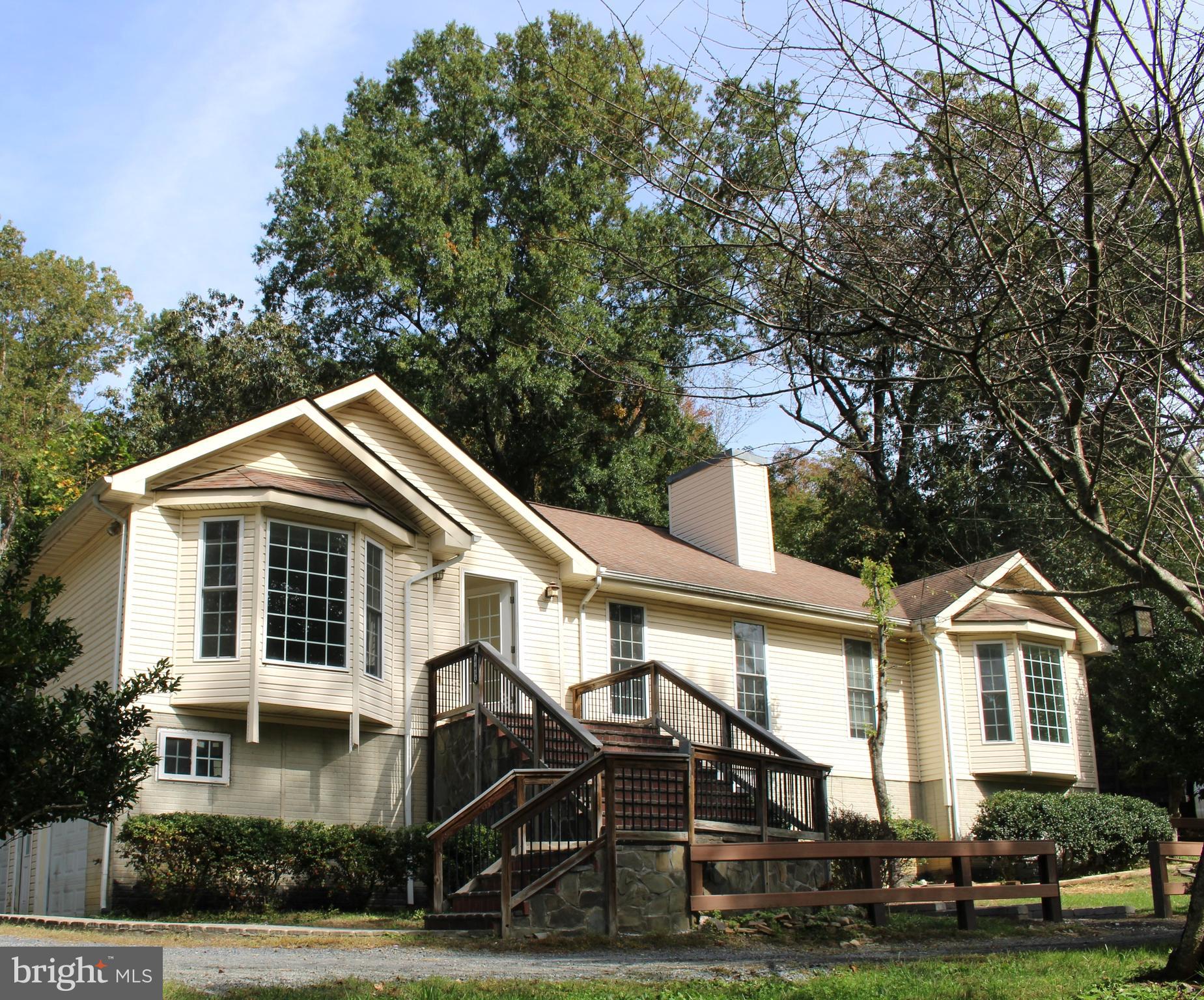 LOCATION, LOCATION, LOCATION, Beautiful house with 3 Acres! Very large Kitchen, great living
 room, separate dining room, Ceiling Fans, Oversized Recreation room and
 Den. Lots of storage. Sideload garage w/opener. Private setting! Close to I-95, Shopping Centers and Quantico Base.