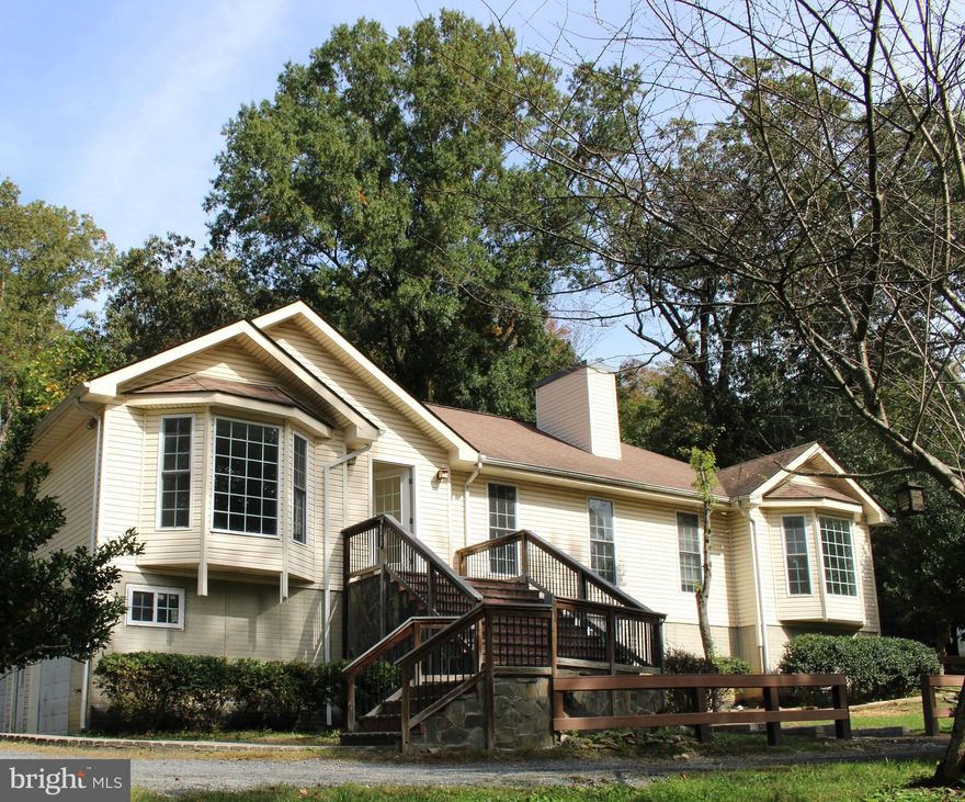 LOCATION, LOCATION, LOCATION, Beautiful house with 3 Acres! Very large Kitchen, great living
 room, separate dining room, Ceiling Fans, Oversized Recreation room and
 Den. Lots of storage. Sideload garage w/opener. Private setting! Close to I-95, Shopping Centers and Quantico Base.