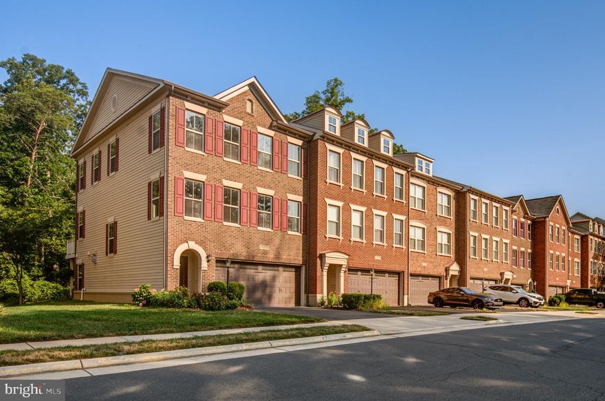 END, CORNER Townhome built by Winchester Homes in the heart of coveted, much desired BRAMBLETON Sub-Division can be yours! Original Owners | A rare find! A home w/abundant natural light from all three directions & surrounded by mature trees at front & rear | Top rated schools | Ample guest parking right at front of the home | Just a few steps to tot-lot | <br><br> Year 2022 ROOF w/GAF shingles; 50 year warranty, materials + labor | Dual Thermostat w/electronically operated dampers | Multimedia points in great rm, living rm, office, primary bedrm, guest bedrm, & rec area | Freshly painted | <br><br> Charming  home w/3,182 sq. ft. of interior finished at its 3 levels w/rear extensions, is equipped w/spacious 3 bed rooms, 2 full baths, a half bath, office/library  w/double doors at main level, den w/lited sliding pocket doors @ main level (can be used as bedrm; the wall can be removed if someone is looking for larger family area | <br><br> Attached, front-load, 2 car garage w/lited (at top) garage door, garage opener, keypad, & a storage area underneath the stairs | Precious walk-out home site | Half glass front door; brings in sun light, yet keeps it private | Tiled foyer |  Open oak staircase w/carpet runner from foyer to main level | Ample recessed lights | Custom blinds | Ceiling fans | <br><br> HW floors thru main level | Gourmet kitchen w/modern flat cabinetry, SS appliances, granite counters, undermount sink, backsplash, &  center island | Sliding door w/transom window above to cozy deck area | Owner's suite w/sitting area, tray ceiling, & large walk-in closet. Primary bath w/his & her vanities, expansive tub & separate standing shower | Two spacious secondary bedrms w/vaulted ceilings; share a hall bath | Washer & Dryer closet at bedrm level | Basement offers a huge recreational area w/corner fireplace & a full bath. Sliding glass door at recreation area leads to wooded backyard | <br><br> HOA fee: Year-round lawn care & mulch, Verizon cable, high-speed internet. HOA Amenities: Access to 5 community pools, a wide array of parks, 18+ miles of trail across the neighborhood, lighted tennis, sand volleyball & basketball courts. Association offers programs like art, dance, drama, summer camps for all ages & exciting events organized throughout the year. 3 club houses are available for rentals for parties | <br><br> A few minutes away to Hal & Berni Hanson Regional Park | Just a few miles away to restaurants, pharmacy, groceries, boutique retailers, movies, meeting places, parks, recreational areas, intricate trail network, state of the art library @ Brambleton Town Center | Major Commuter Routes: NorthStar Blvd, Belmont Ridge Rd, Loudoun County Parkway, 267 Greenway/Toll, Rte 50 |  Quick access: Public transportation, Ashburn Metro (Silver Line), NOVA, Dulles International Airport, Loudoun Station, Brambleton Town Center, Broadlands Village, One Loudoun, Dulles Landing | Excellence in location & convenience |