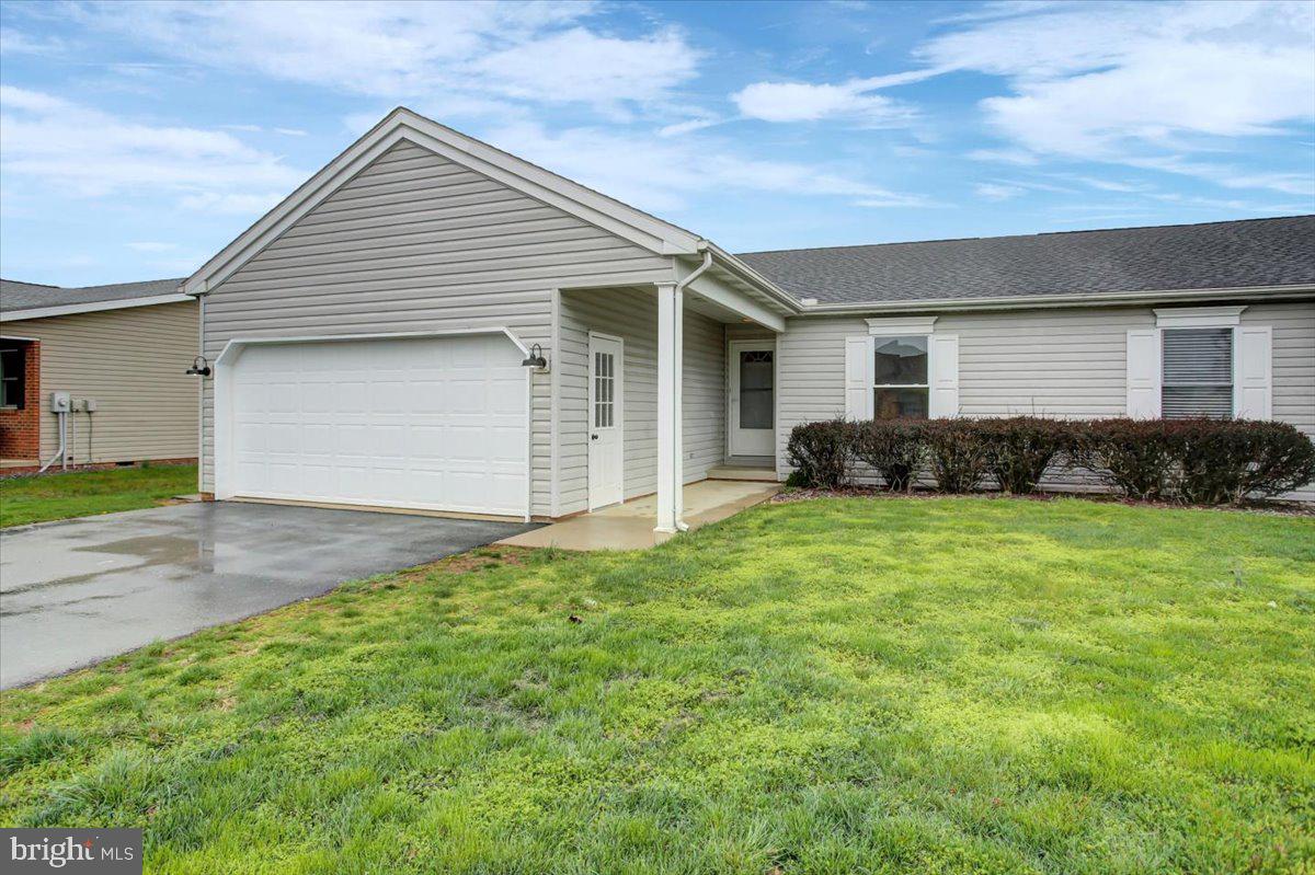 Just starting out or looking to downsize?....This spacious single level living duplex close to many downtown amenities is the place to call home! Enjoy all of the conveniences of being close to downtown, including restaurants, Grocery stores, shopping and more! This unit is move in ready with a newer central AC unit, new flooring, paint and fixtures throughout. The spacious garage offers ample storage space. Enjoy the outdoors too on the covered patio. Not many properties like this come along too often....schedule your showing today before its too late!