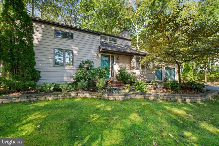 A Serene 2-Acre Retreat in West River Beckons You Home.  It's the perfect blend of charm and modern convenience.  The living room features a vaulted ceiling and hardwood floors, creating an inviting atmosphere for gatherings or quiet evenings.  The kitchen was completely updated in 2020, making it a chef's dream.  It's equipped with modern appliances, ample counter space, abundant storage and beautiful cabinetry.  Enjoy the splendor of nature from the stunning 3-season room.  The mahogany ceiling and floors add a touch of elegance to your space.  It's the ideal spot for relaxation or entertaining guests. No need to climb stairs at the end of the day. The primary bedroom is conveniently located on the main level, offering ease and accessibility.  The 3rd bedroom is currently configured as a loft, but offers versatility to suit your needs.  You can easily convert it into a traditional bedroom, office, or cozy reading nook to complement your lifestyle.

Your vehicles and outdoor gear will find a home in the spacious two-car garage.  A separate shed offers additional storage space.  Enjoy the peace and tranquility of a private, wooded lot without the restrictions of an HOA (Homeowners Association).  This property offers the perfect balance between a tranquil retreat and accessibility to the city. An easy commute to Washington, D.C. makes it an excellent choice for those who work in the nation's capital but desire the serenity of suburban living.

Don't miss out on this fantastic opportunity to own a charming Cape Cod-style home on a beautiful 2-acre wooded lot. Contact us today to schedule a viewing and make this your dream home!