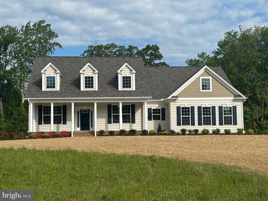 Sold & Settled - QBHI's Ashland Housestyle with sideload, Maintenance Free Screen Porch, Deluxe Shower, Center Ext., LVP Flooring throughout, Quartz Countertops, Upgraded Appliance.