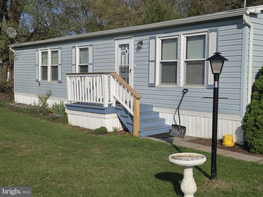 Step into comfort and affordability with this well maintained 1989 doublewide home priced to sell and ready for its next owner. This spacious 3?bed, 2?bath property features an enclosed rear porch that expands your living space and offers a peaceful spot to unwind with family and friends.
Located in the highly desirable Conewago Valley MHP within West Shore School District, this home delivers unbeatable value with **super low taxes** and a **lot rent of just $320/month**, which includes water, sewer, trash, and snow removal on park roads.  Recent updates include new laminate flooring in the living room, hallway, and primary bedroom. Enjoy vaulted ceilings, central air, an efficient heat pump, washer and dryer, off street parking with room to expand, plus a rear shed and mower included for added convenience.  Park approval is required, and applicants with a credit score of 700+ typically see the best results. Inside cats are welcome, however, dogs are not permitted.  Don't miss your chance to make this affordable, move-in ready home yours. Opportunities like this don't last long in Conewago Valley MHP.