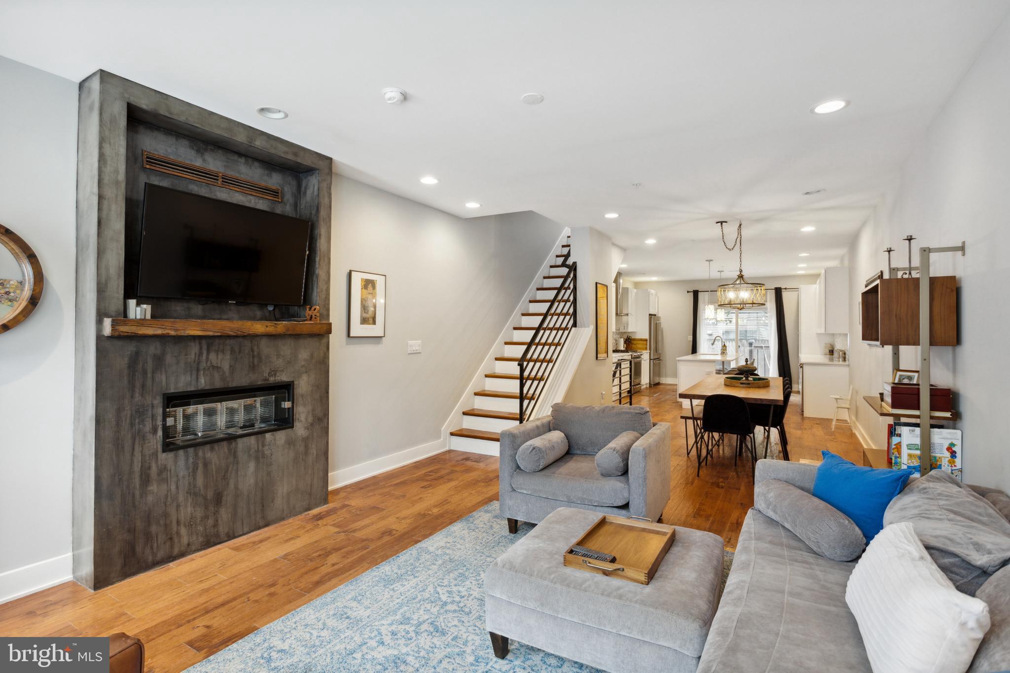 Gorgeous recent construction home on a charming block of Point Breeze with a panoramic roof deck and over 5 years left on the Tax Abatement! This beautiful home features 3 large bedrooms and 3 full bathrooms, as well as a finished basement with a full bathroom and egress that make it well suited for an additional bedroom, entertainment space, or workout area. The main level welcomes you with a spacious and open concept living room, dining room and kitchen that boosts sleek hickory hardwood flooring, high-end finishes, stainless steel appliances, a large island for extra counter space, a pantry, quartz counter tops, and a luxurious built-in wine cooler. There is ample fenced backyard space perfect for grilling and gatherings. Make your way to the second level for 2 large bedrooms, a full bathroom, laundry, and a large storage space. The third floor consists solely of the abundant master suite that includes a gorgeous master bathroom, extraordinary private balcony and plentiful walk-in closet space. Heading up to the roof deck, encounter a stunning skyline view and plenty of space for relaxing or entertaining. Do not miss out the highly unique CUSTOM BUILT FULLY INFRARED SAUNA with a heated floor and interior led light providing the ultimate soothing effect! This luxurious feature can accommodate 3 people at a time and has a cedar interior with interior and exterior controls for light, time, temperature, radio, CD player and USB port. Temperatures go up to 150 degrees. This breathtaking property is in a prime location just a short walk near multiple coffee shops, restaurants and breweries including Sardine Bar, South Philly Tap Room, On Point Bistro, and countless others. Walk to Rittenhouse Square in minutes or jump on the multiple bus lines or nearby Broad Street Subway line for easy access to Center City and other local points. Quick walk or drive across the river to the University City hospitals and universities. Schedule your showing today!