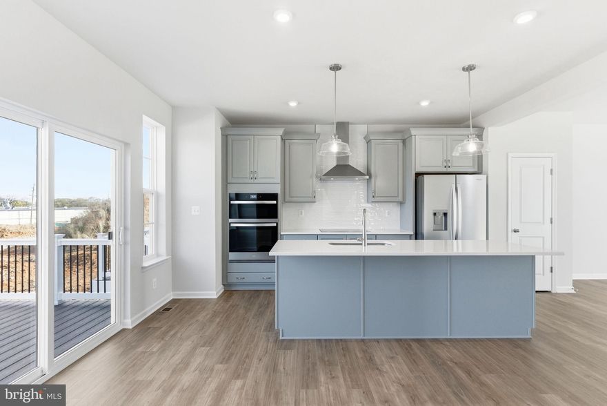 END UNIT Luxury 3 level/3 bedroom townhome with 1 car garage located in the heart of Winchester! Possibility of 4th Bedroom/flex base in the basement available!
***OFFERING UP TO $7K IN CLOSING COST ASSISTANCE FOR PRIMARY RESIDENCE WITH USE OF APPROVED LENDER AND TITLE!** SPECIAL INTEREST RATES AVAILABLE** CONTACT SALES CONSULTANT FOR DETAILS*
MOVE-IN READY! Explore Winchester’s new luxury townhome community. Gourmet kitchen highlights this luxury 3-level end-unit townhome in Winchester, backing to the community pond and ready for immediate move-in. Features upgraded gray cabinets with crown molding, wall oven and microwave, standalone cooktop, and large island with seating. Offers 3 bedrooms, 3.5 baths, plus potential 4th bedroom/flex space with full bath on the finished lower level. Wood stairs throughout, bedroom-level laundry, 1-car garage, and 10x14 maintenance-free deck.