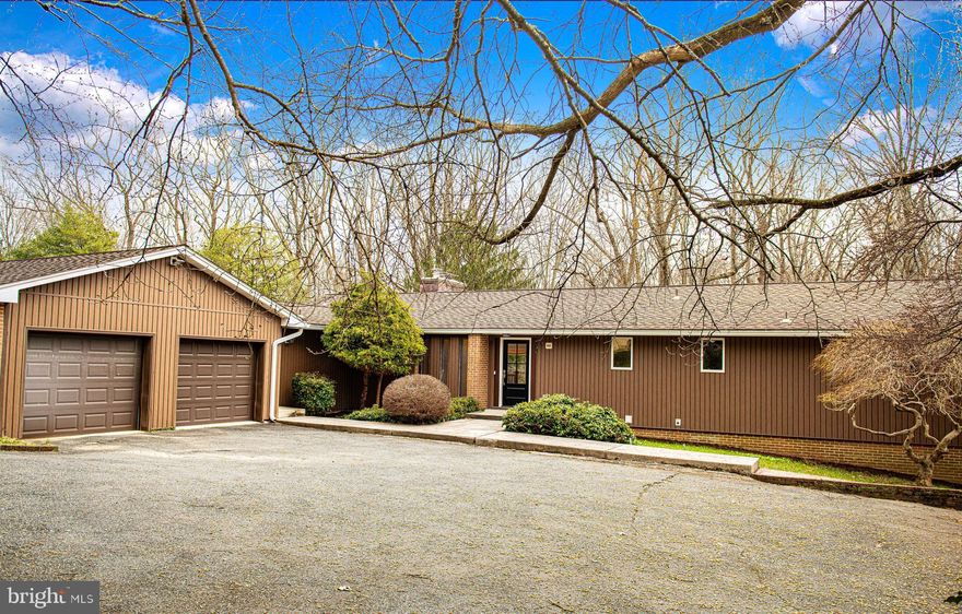 This is a Roughly 4000 sq. ft. Rancher with 5 Bedrooms and 3 1/2 baths . Kitchen is New and Baths have been updated. French Oak Floors throughout. Master Bedroom has Sunroom/Sitting Room overlooking  Back yard and Woods. Hugh Deck off Dinning/and Living  Room . 2 Fireplaces. New Appliances. Side Deck off Kitchen. 1.06 acres backing to Woods.