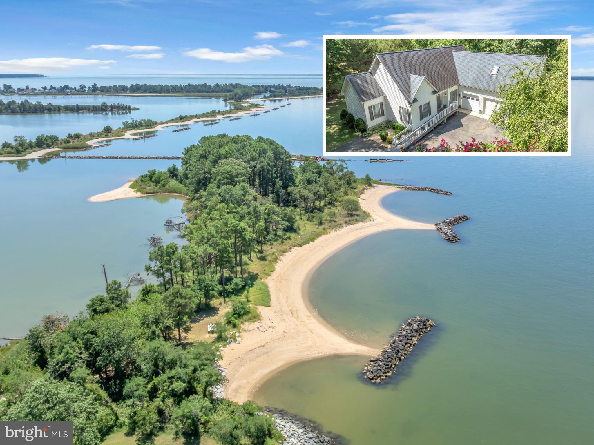 Located in the desirable Landings at Piney Point, this waterfront property is a private retreat on a serene, wooded 1.5-acre lot. Surrounded by mature trees and a lush canopy-lined driveway, the home offers a rare sense of seclusion and immersion in nature, setting it apart from others in the community.
Enjoy your own peaceful paradise with an assigned boat slip and boat lift at the community marina on the Potomac River, plus resort-style amenities like an in-ground pool, private beach, tennis and pickleball courts, basketball, playground, and RV parking.
Inside, the home features four bedrooms and 3.5 bathrooms, including three bedrooms on the main level and a spacious in-law or efficiency suite above the oversized 3-car garage. The suite includes a kitchenette, full bathroom, separate heat pump, and a large walk-in attic for extra storage.
You’ll love the open-concept living area, featuring a gas fireplace and sliding doors that lead to a screened-in porch with a ceiling fan, as well as a huge deck, perfect for entertaining or relaxing in privacy.
The kitchen is a showstopper with granite countertops, black gunmetal appliances, an oversized island, a breakfast bar, two pantries, under-cabinet lighting, and ample storage space.
The primary suite features two walk-in closets and a luxurious enclosed bathroom with dual sinks, heated floors, and a private closet.
A handicap-accessible ramp leads to the front entrance, and one of the guest bathrooms has an accessible walk-in shower with safety bars for handicap accessibility.
Just 20 minutes to NAS Pax River and close to Piney Point Lighthouse Museum & Historic Park, Ruddy Duck Seafood & Alehouse, this home offers privacy, comfort, and a lifestyle in a community that offers resort-like living.