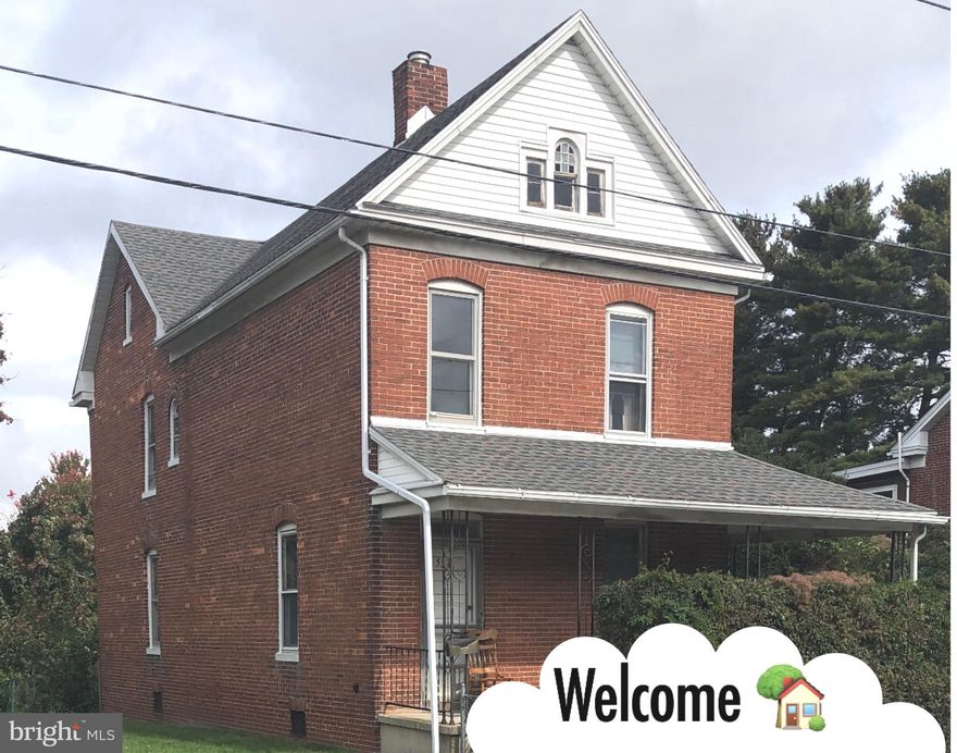 Attention Investors! First Time Homebuyers Welcome! Affordable home! Great opportunity to own your own home for less then rent! Solid brick 2 story colonial with wrap around porch. First floor laundry room. Large eat-in kitchen. Hardwood floors throughout. Bring this beauty back to life with a little TLC. Bring your ideas and plans and make this home your own! Earn instant sweat equity! Large in-town lot .24 acres. Room for additional off street parking from rear alley access. Fenced yard. Great location within walking distance to schools. South Western School District.